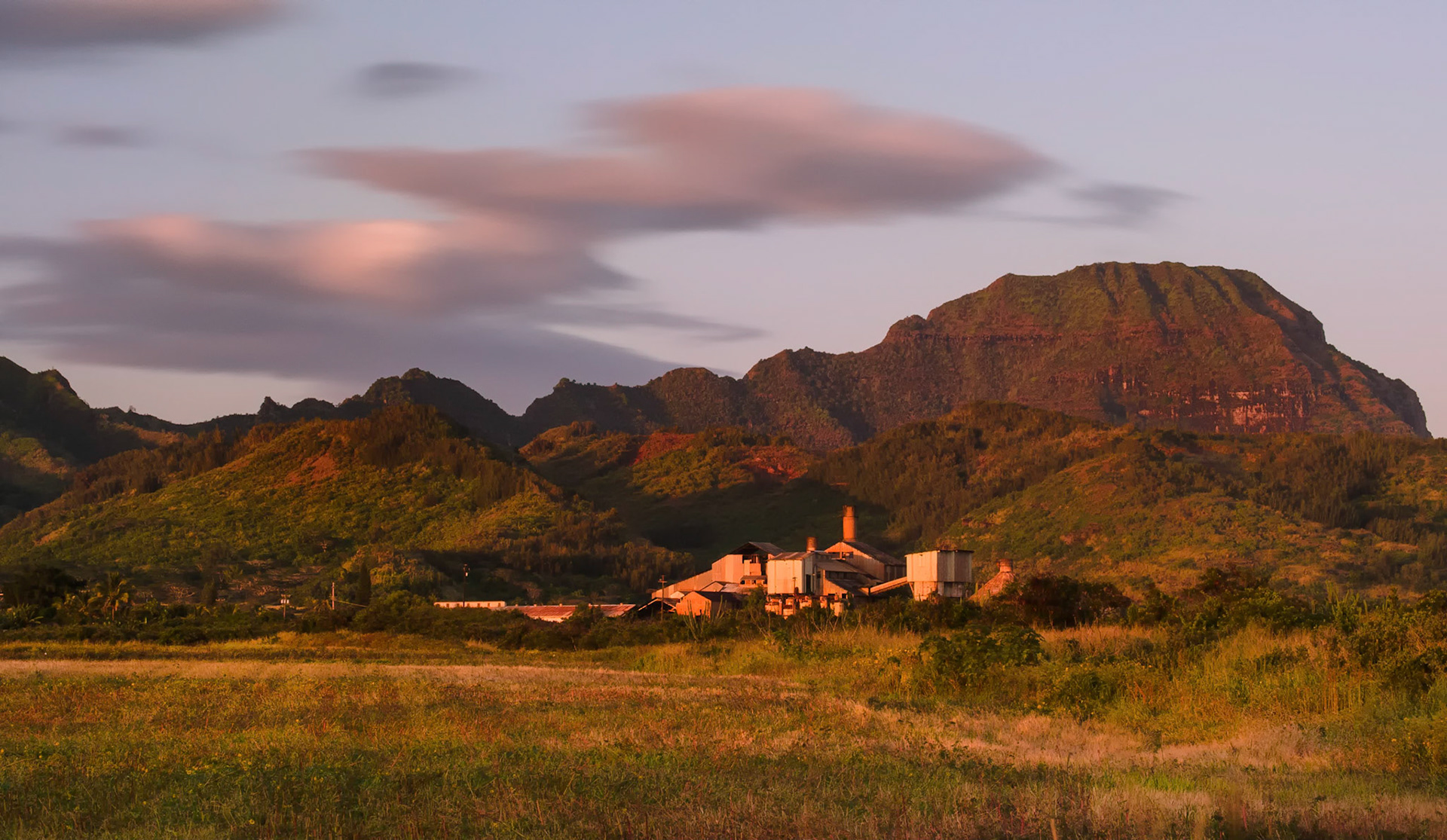 Another rendering of the abandoned sugar mill beneath the Ha'upu range in Kauai.