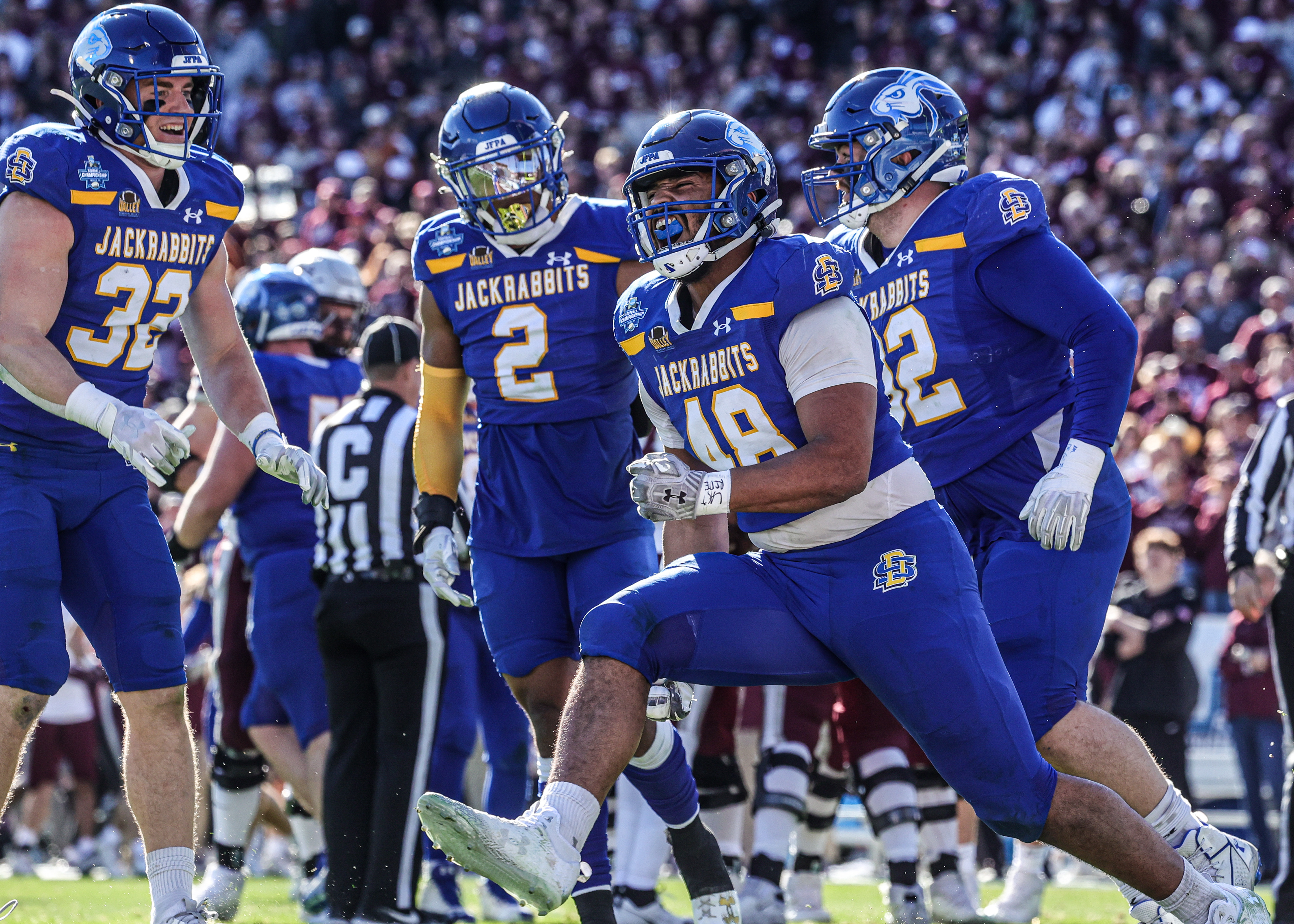 Defensive lineman Quinten Hicks celebrates after a crucial third-down sack against Montana in the 2023 FCS National Championship. Coming late in the game, the stop swung momentum and brought the Jackrabbit defense to life.