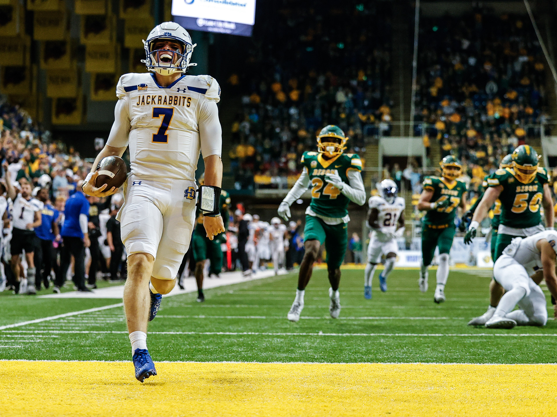 Quarterback Chase Mason breaks free for a long touchdown run against rival North Dakota State, delivering the go-ahead score in a clash of the nation’s top two teams.