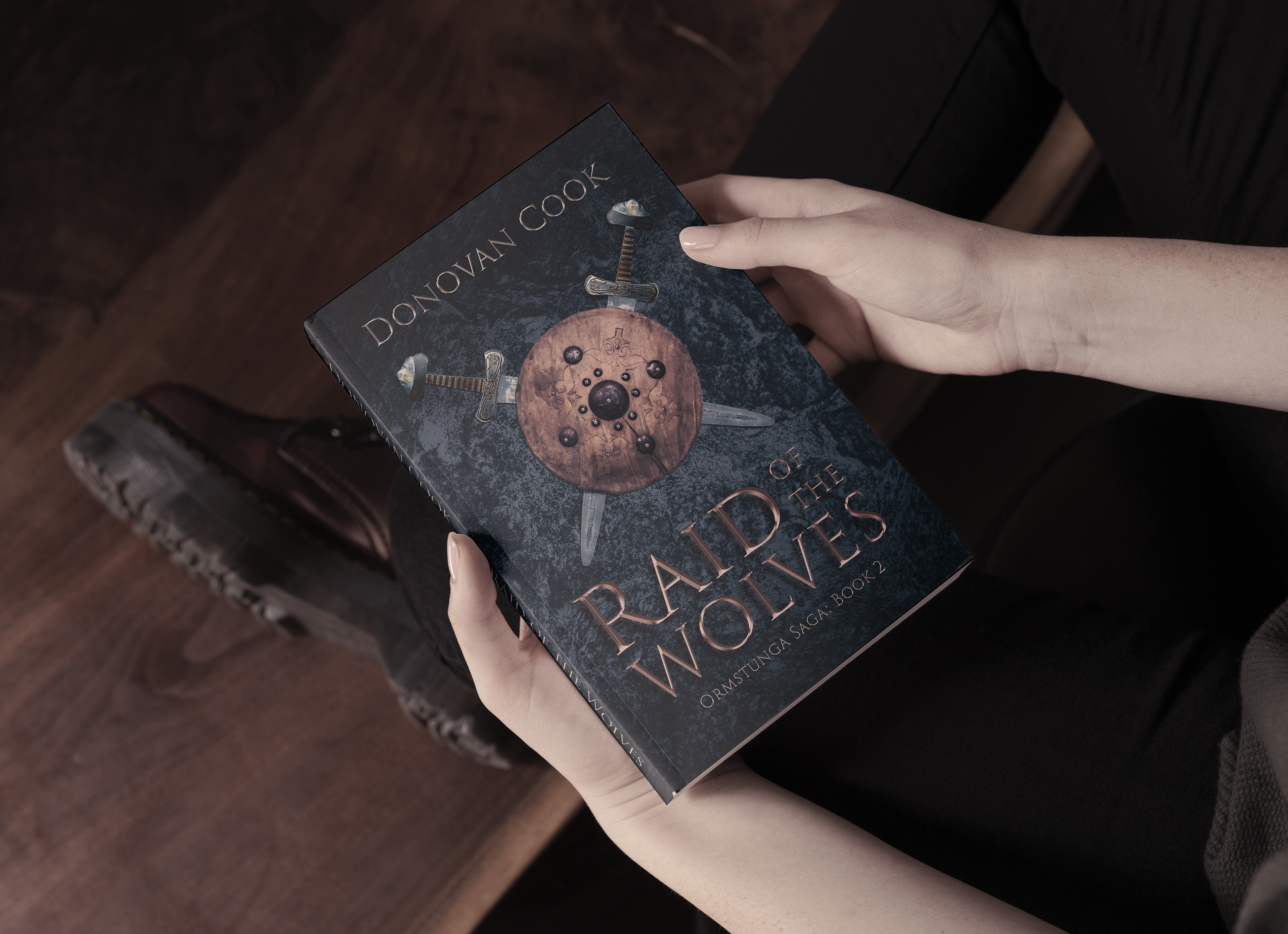 book cover design created for the novel "Raid of Wolves."