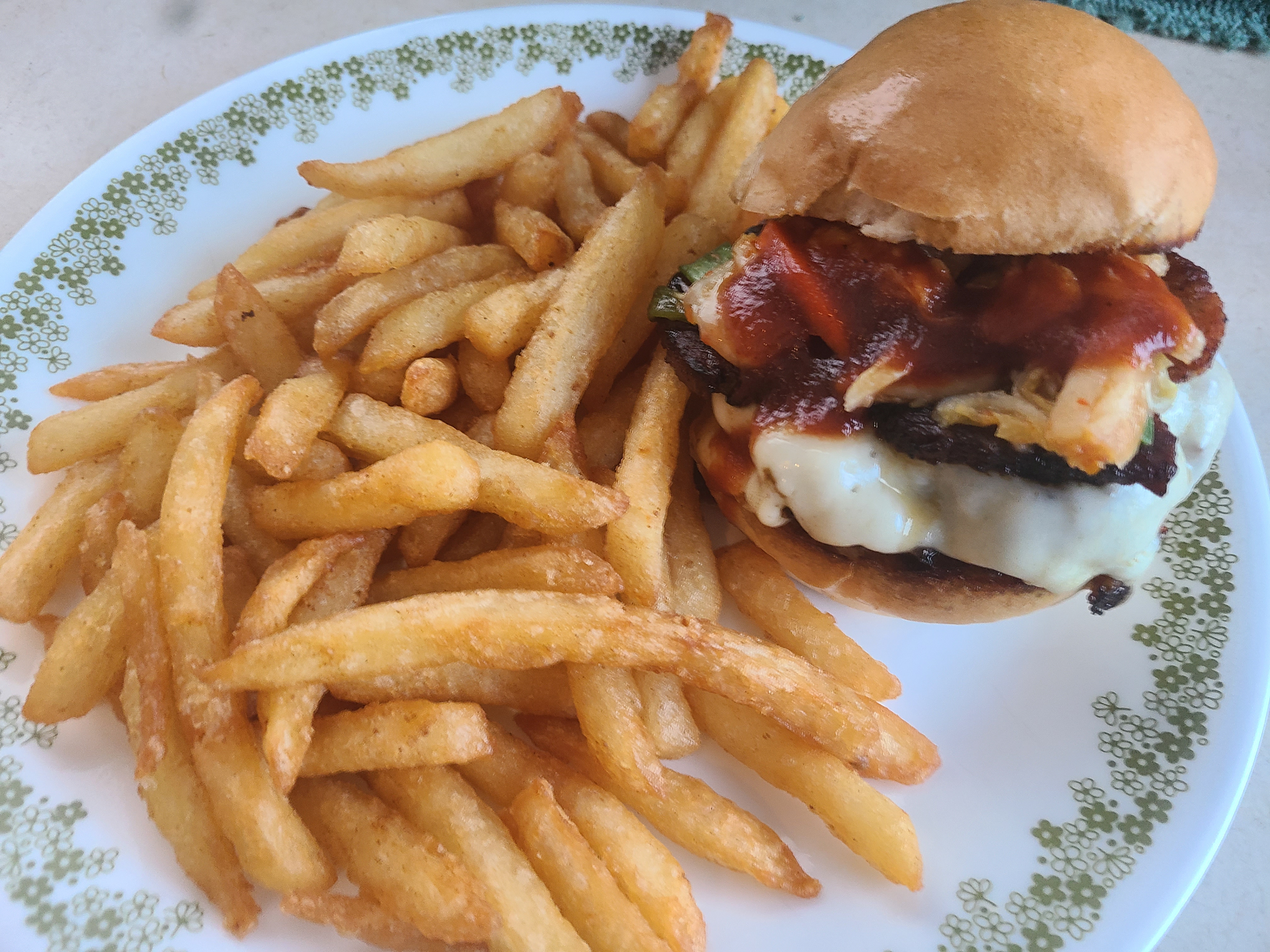 Kimchi Bacon Bliss - Sheep Flockers - 1/3 lb local sourced angus patty topped with a slice of munster cheese, homemade bacon and kimchi with our signature bbq sauce. Served with a side of fries.         We will be parked at Great Outdoor Store parking lot; Wednesday: 4-8pm Thursday: 11am-8pm Friday: 4-8pm Saturday: 11am-8pm Sunday: 11am-8pm