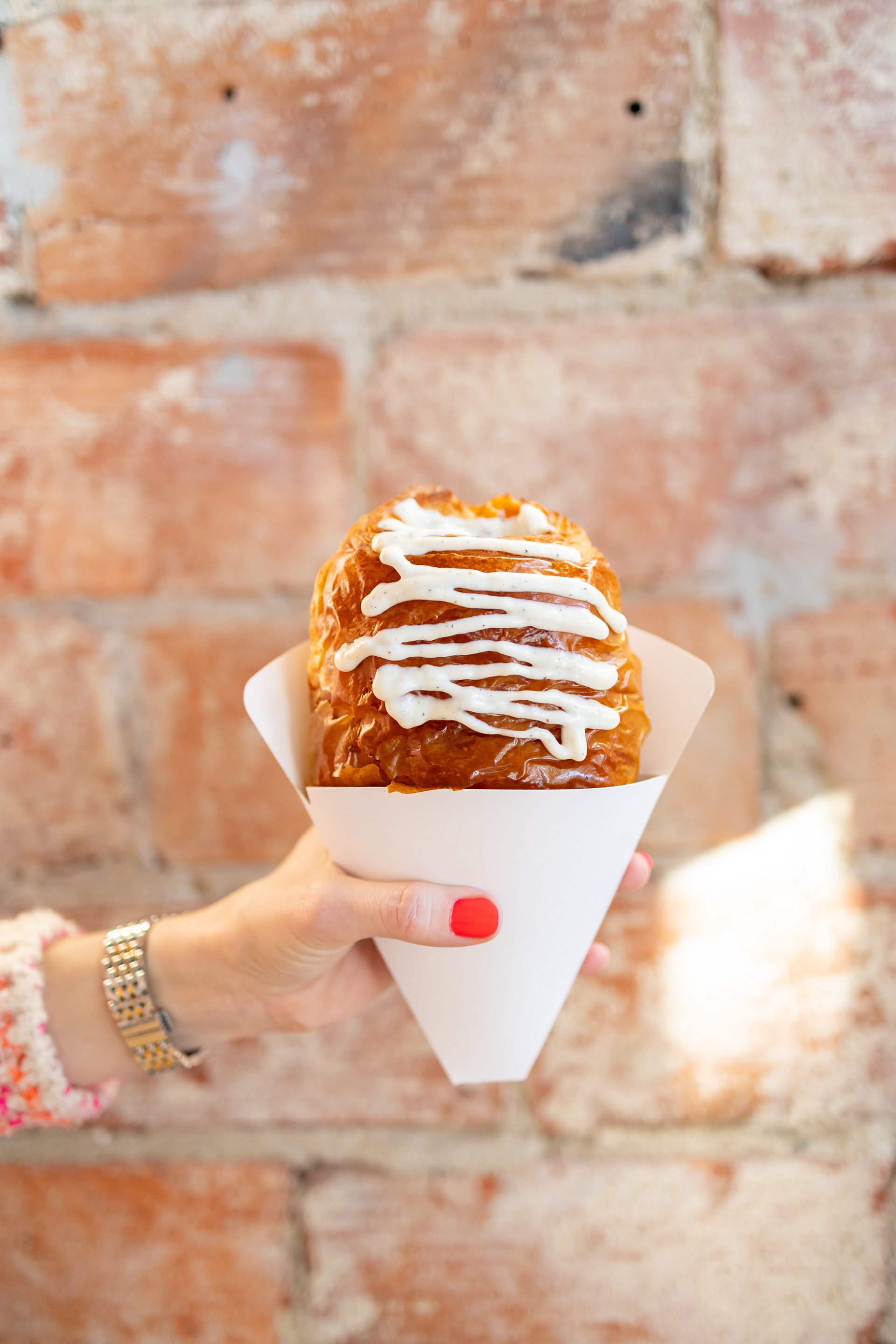 An American in Paris Street Burger - CH Patisserie - Onion smash burger, cheddar, bacon, CHP sauce…all wrapped in a warm duck-fat croissant.