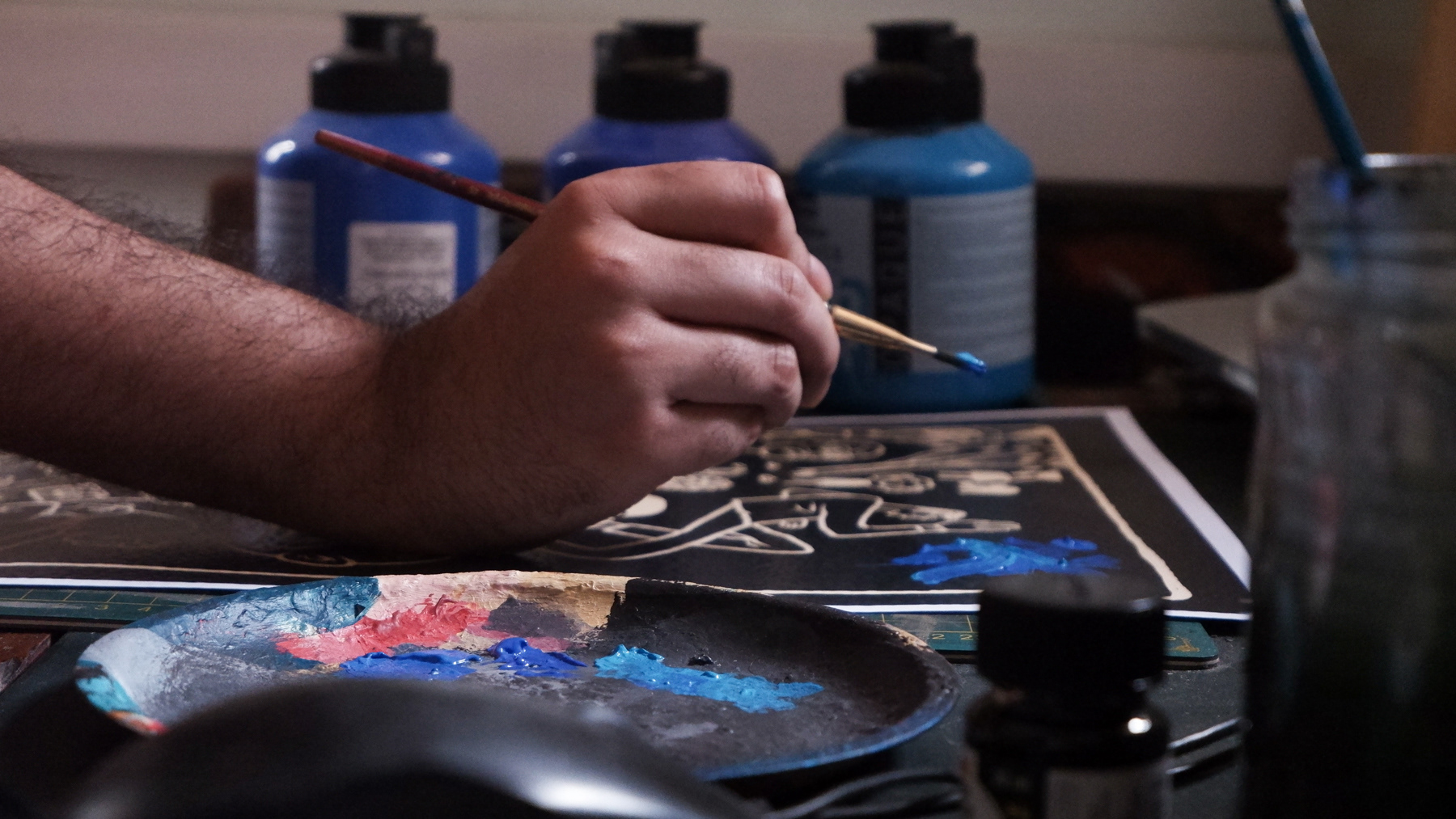 The blue areas are hand-painted with acrylic.