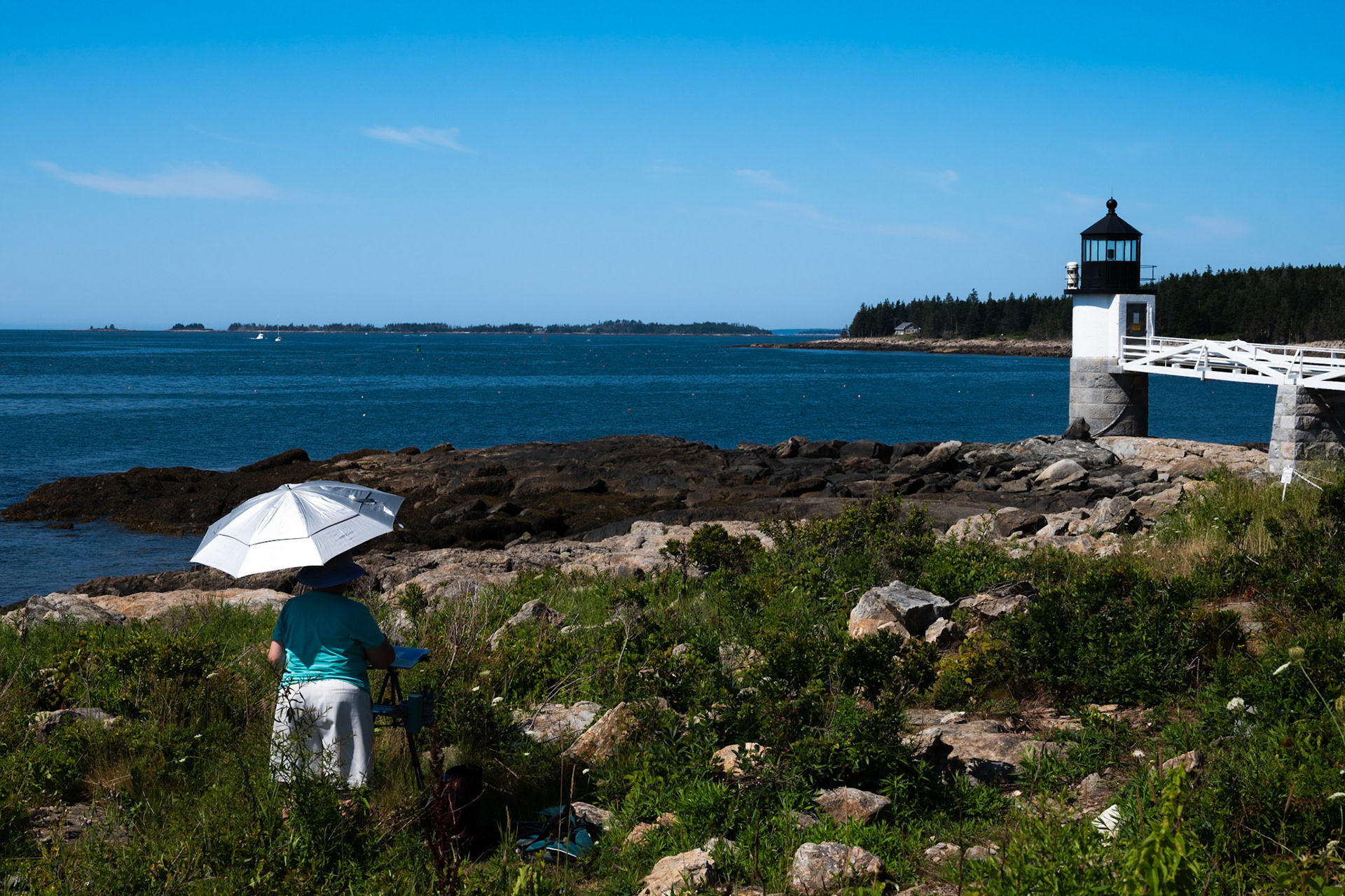 Painter Capturing Lighthouse