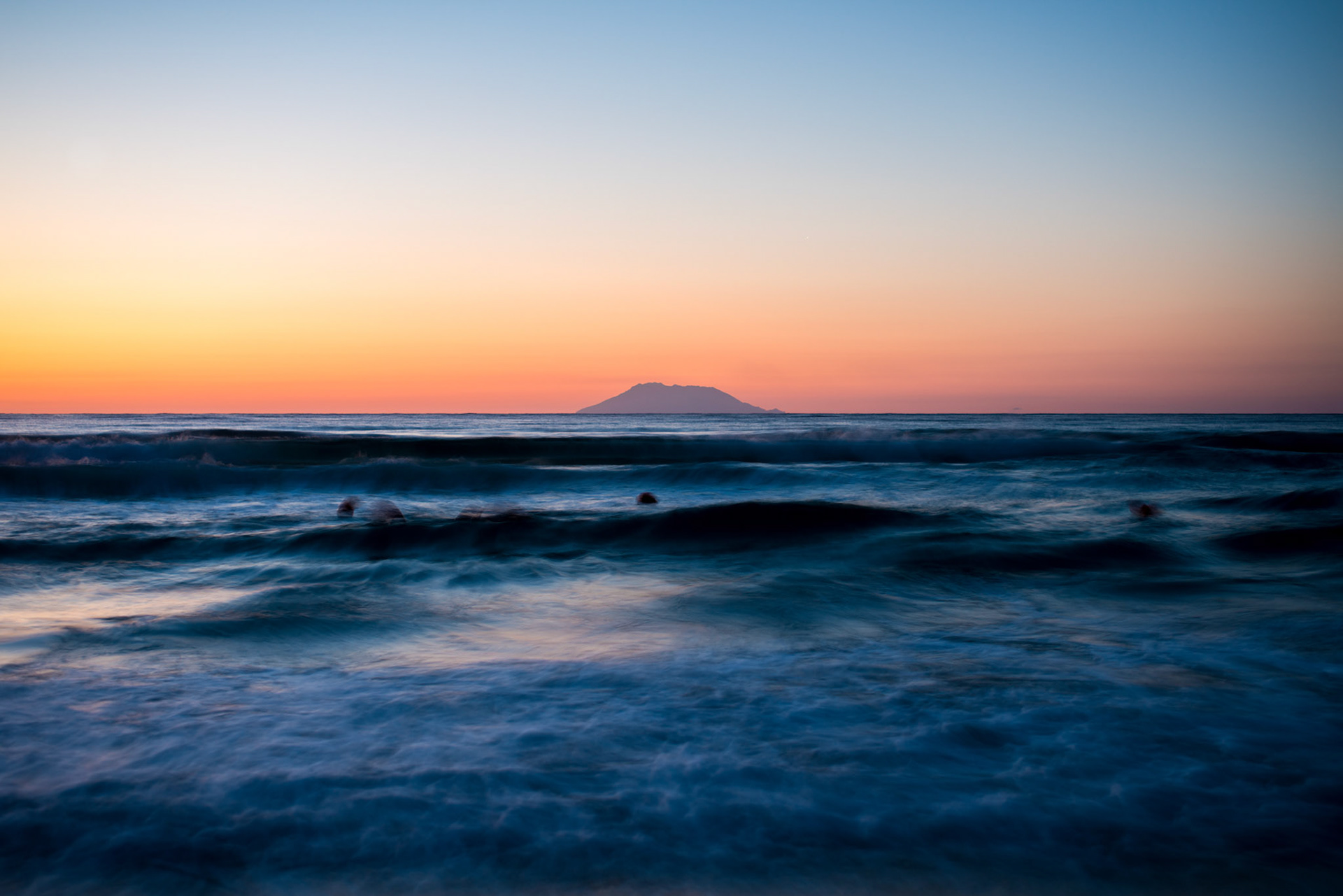 Samothraki seen at dawn from the shores of Xrisi Ammoudia, Thassos island, Greece.