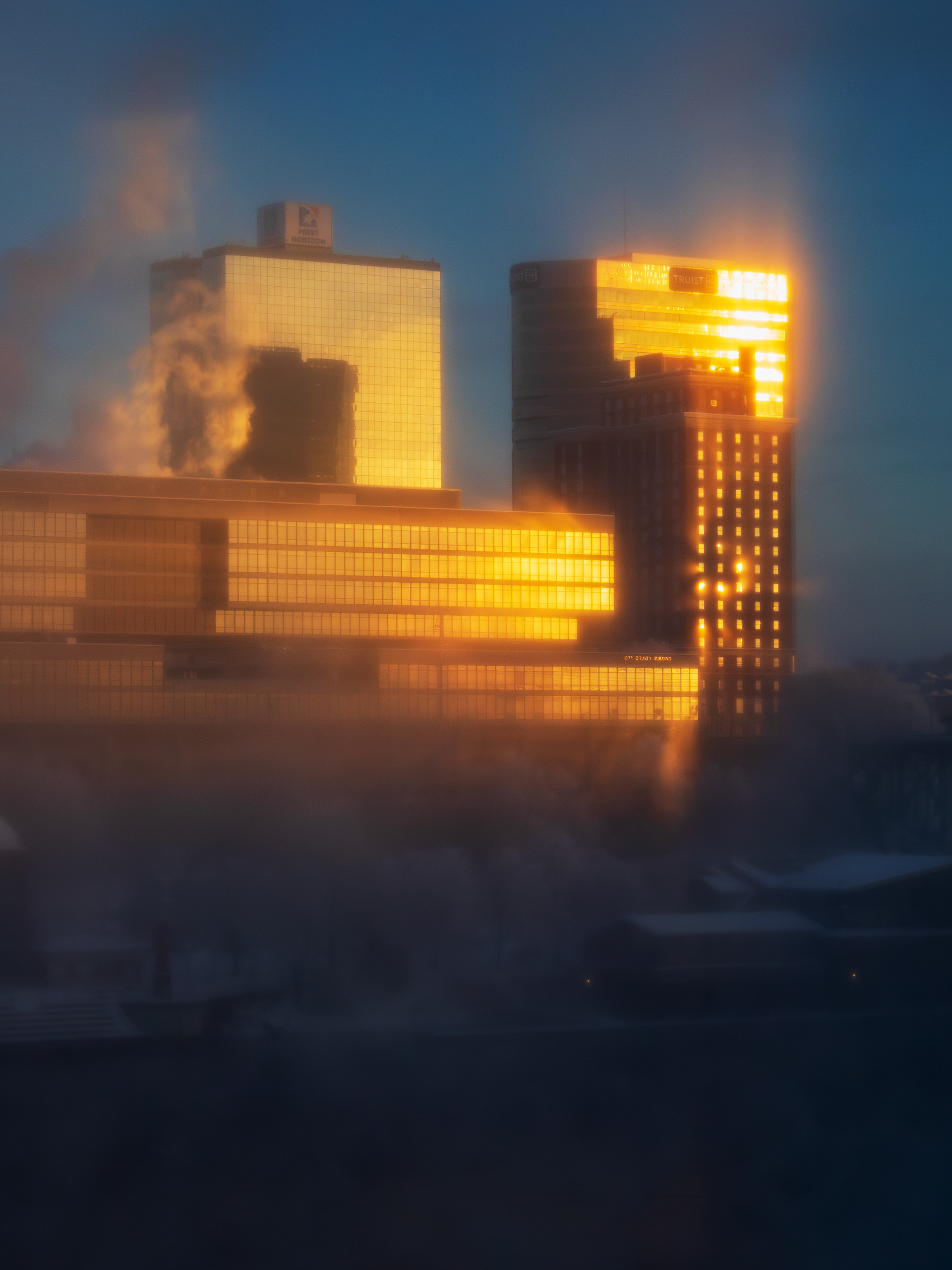 A Winter Sunrise Scrapes Over and Reflects Off the Taller Buildings of Downtown Knoxville.