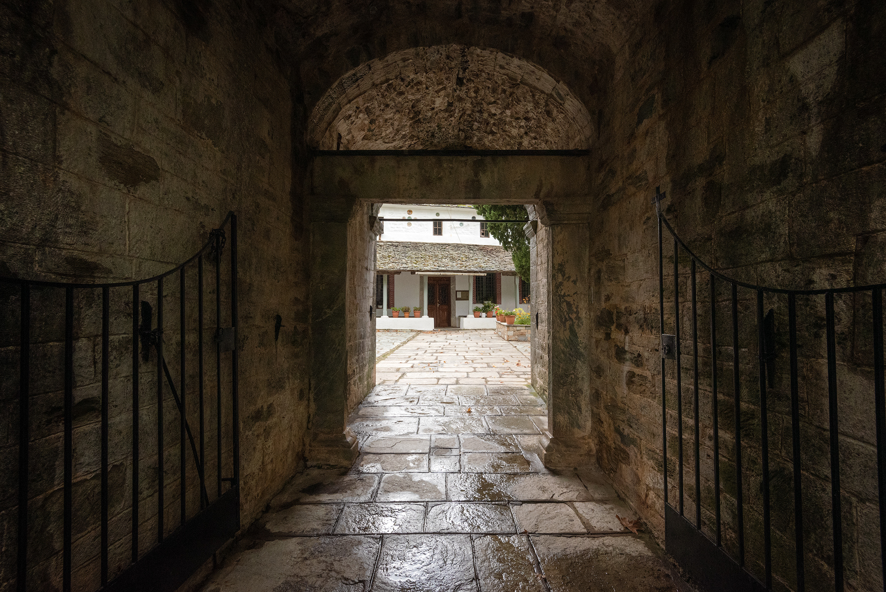 Arched threshold beneath the belltower leading to Agios Georgios Church