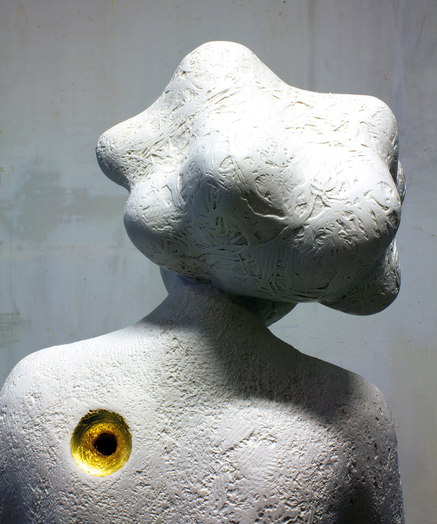 A goldleaf funnel offers entry to the memories.