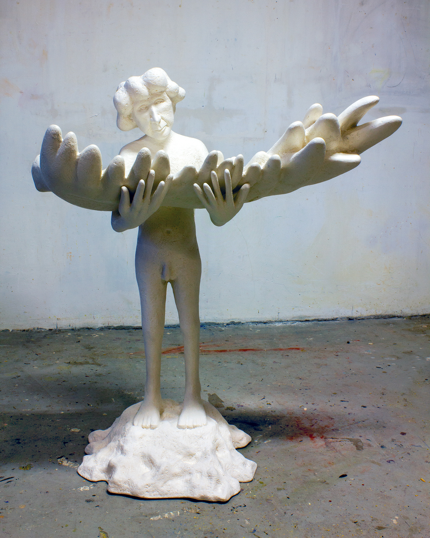 Boy and Wing, synthetic resin and gold, 110 x 88 x 67 cm.