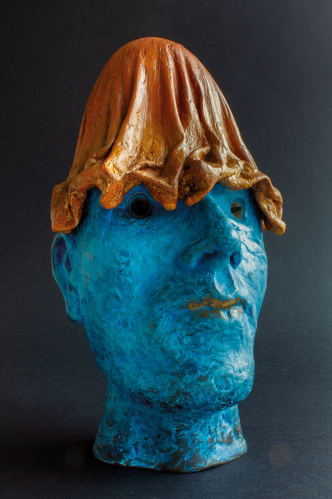 Blue Head. Bronze, synthetic resin, iron, 27 x 15 x 15 cm.