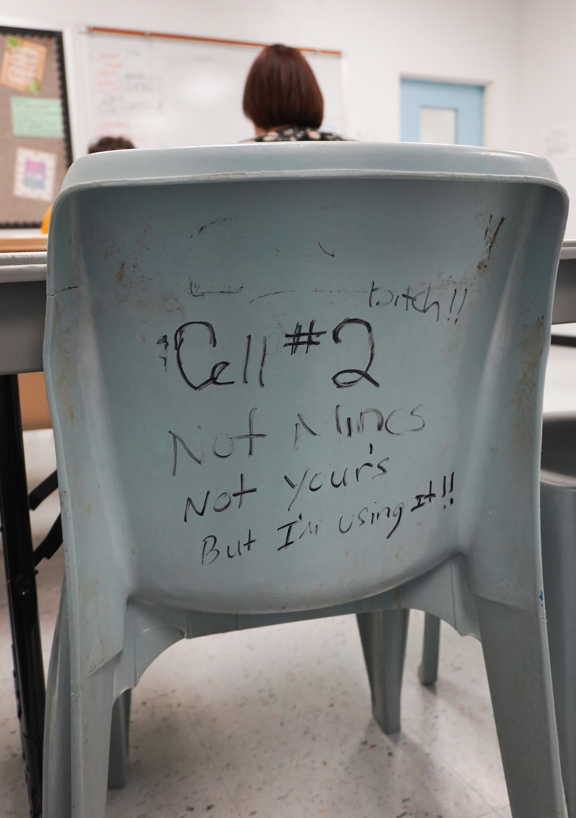 A chair inside a contact room within the St. Louis city jail stands with notes from inmates and other visitors on Wednesday, Feb. 26, 2025, in St. Louis. A goal for the public defenders and social workers is to make sure clients aren’t being held just because they are unhoused or are in need of health services. MSPD employees from across the state have expressed concerns about jail conditions, which are controlled by whoever is in charge of the jail and the funding that comes from the county.