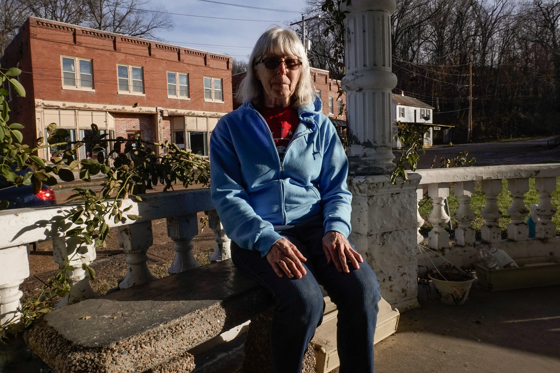 Local Doris Rost poses for a portrait on the balcony of her home on Main Street in Morrison. Rost’s family has been a part of Morrison for generations, with Myron being a name acting as a throughline through her family tree. She has lived in the house since 1974 after growing up on a house on the hill, just southeast of her current home. Rost worked as a schoolteacher in Chamois, later retired and worked at the post office 500 feet from her home and currently serves as the Morrison city clerk. “I like it here. It’s small and quiet, not what it used to be before the flood. When the businesses go, so can the town. I hope to see it revitalized” Rost said.