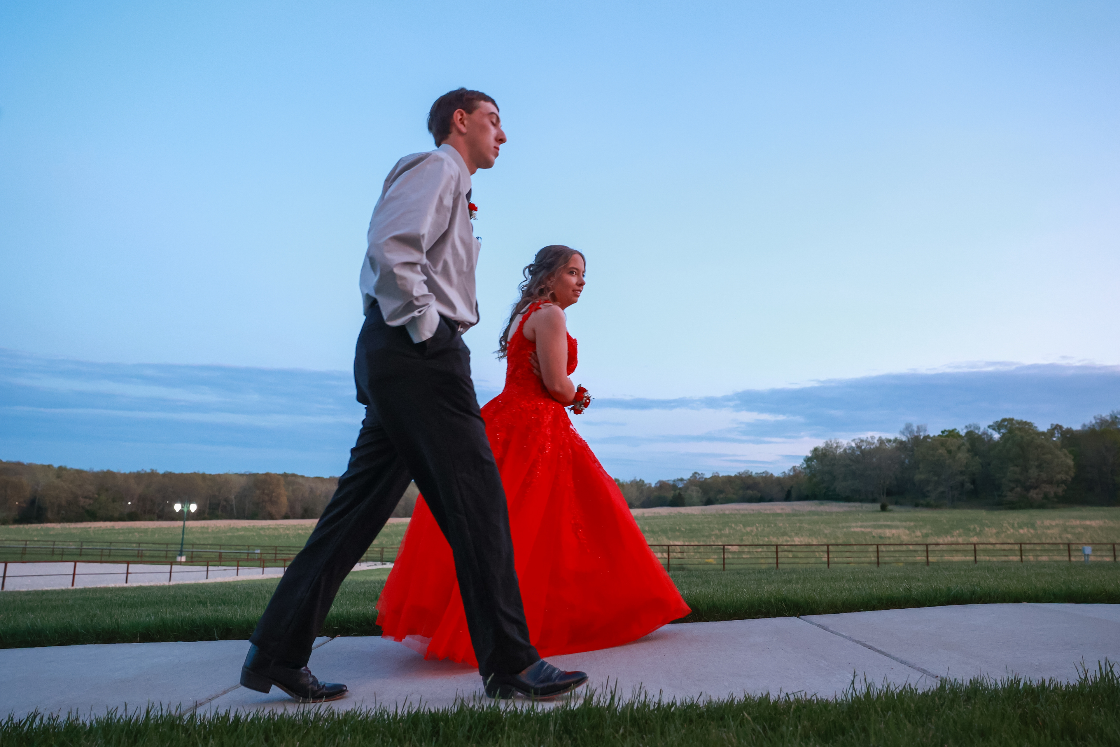 Owensville High School students Wyatt Bridgeman and Shayla Lowe walk into prom on Saturday, April 20, 2024, at Red Oak Valley in Owensville, Mo. Red Oak Valley was decorated in a “Rock-N-Roll Rendezvous” theme, which the 12-member prom committee of OHS juniors voted for.