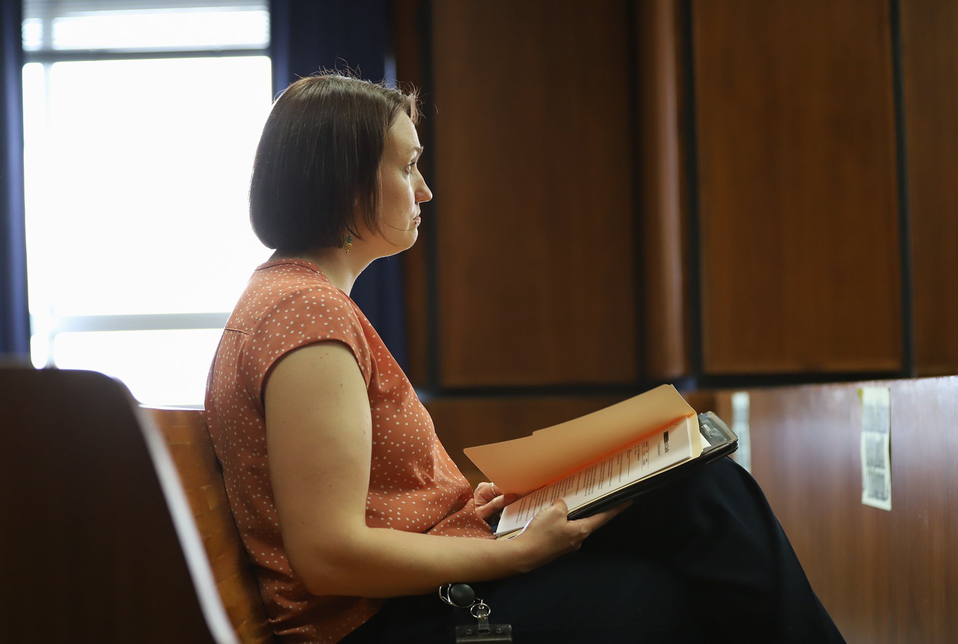 Rachel Lewis sits in Judge Lynne Perkins Division 31 courtroom on Thursday, March 13, 2025, in St. Louis. Lewis one of two full-time social workers embedded in the St. Louis trial office of the Missouri State Public Defender System.