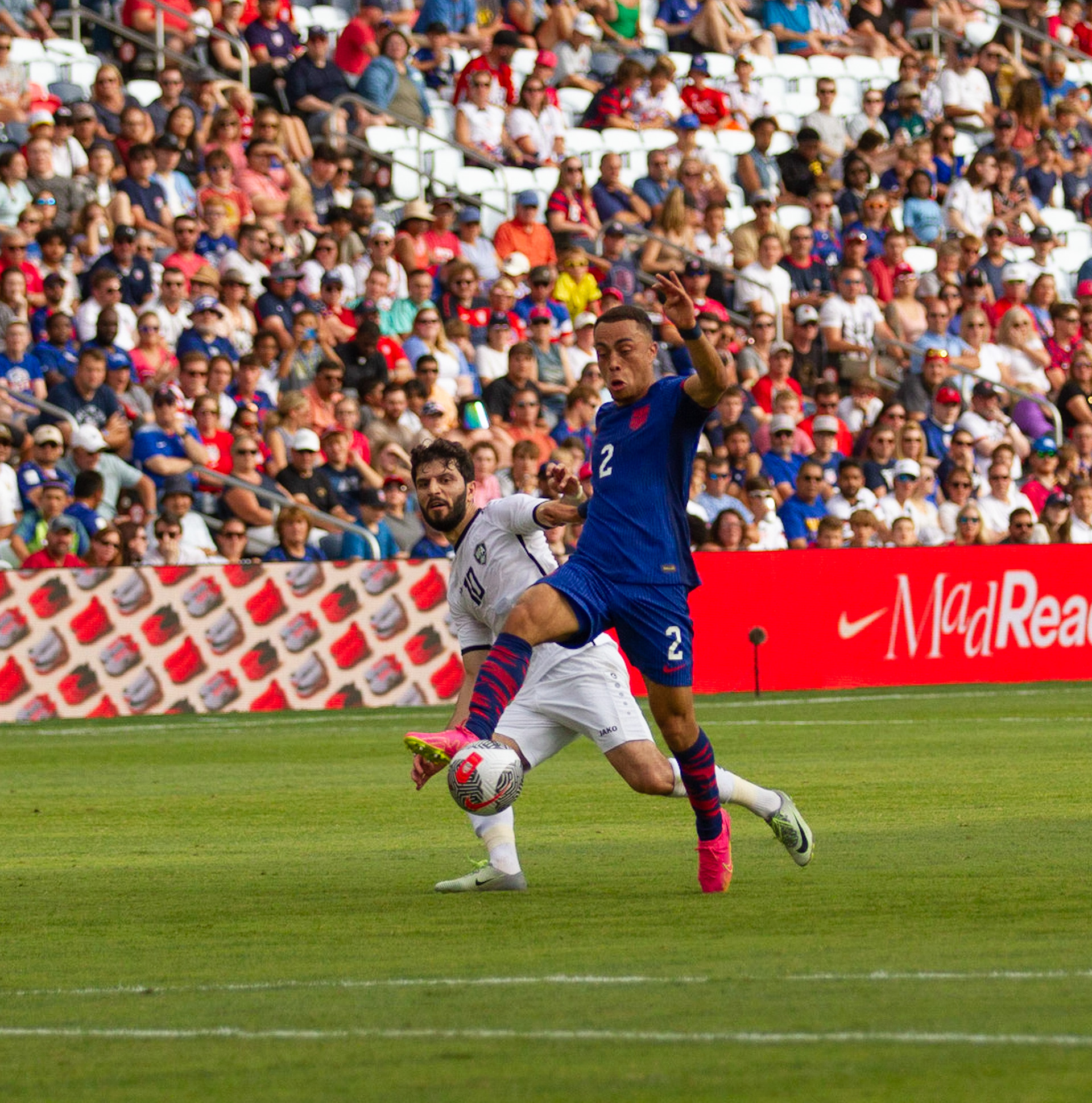 United States Men's National Team defender Segino Dest (2) chases after the ball against Uzbekistan midfielder Jaloliddin Masharipov on Saturday, Sept. 9, 2023, in St. Louis. The States won the friendly 3-0 in City Park. 