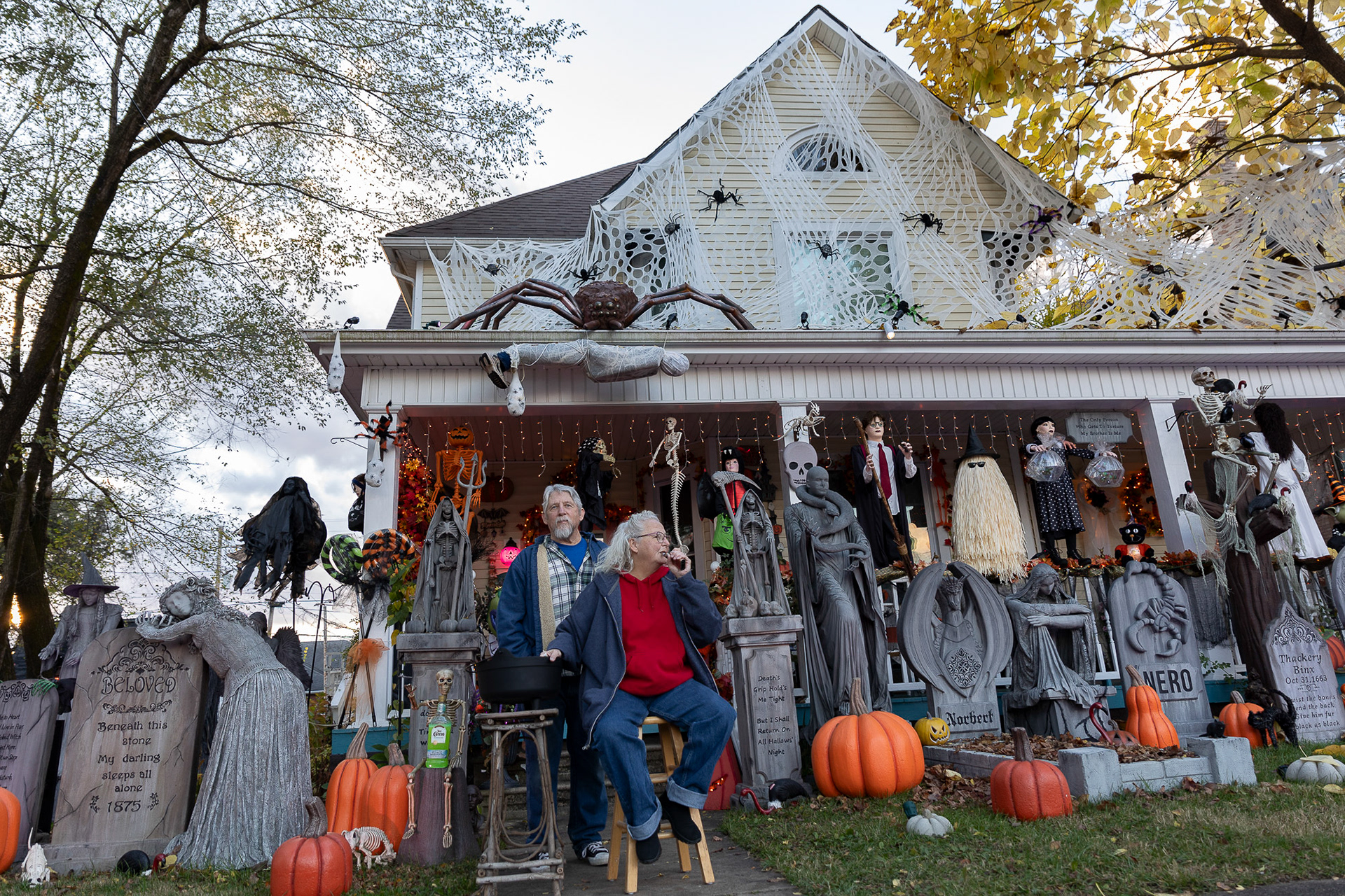 Tim Brown and his wife, Kinda, pose for a portrait in front of their house in Wellston, Ohio, Oct. 31, 2023. All of the decorations in their house are made by them. They have gradually been growing the number of decorations ever since they moved into their house. Mr. Brown worked as an electrician for the Fort Worth Zoo in Fort Worth, Texas, until he retired four years ago. Now he uses his skills to build moving animatronics as Halloween decorations. “I probably won’t stop until I physically can’t make the decorations anymore.” The couple have made so many decorations they are running out of space in their yard to place them. “I think next year, we will decorate the neighbor’s yard as well. I want to build a horse and carriage.” The couple moved to Wellston to be closer to Kinda's mother, "I promised her (Kinda) when I retired, we could move back to her hometown, so here we are," said Mr. Brown.