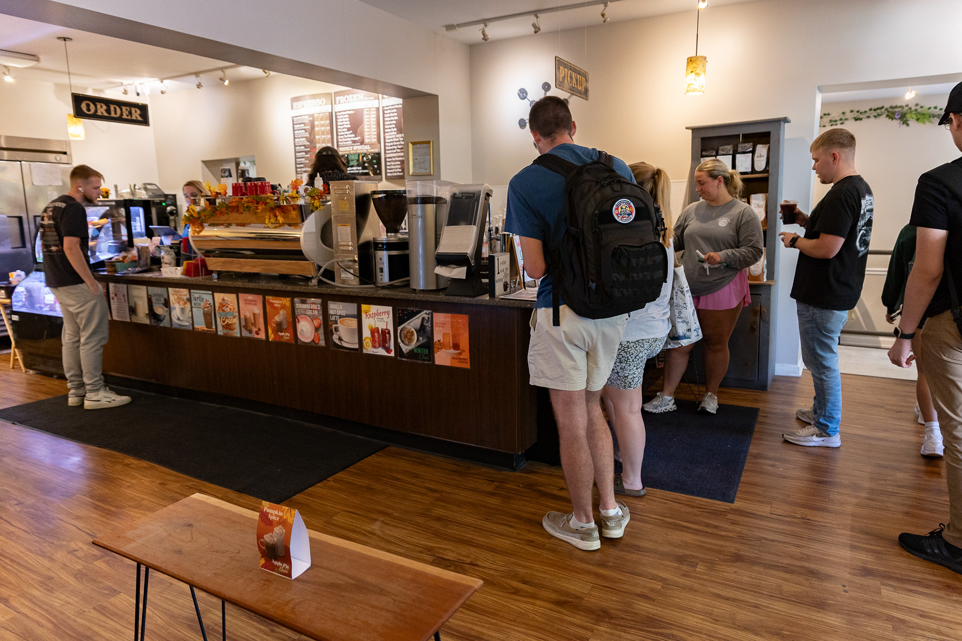 Customers wait for their orders inside Court Street Coffee. The  coffee shop is usually busy during the afternoons with students  either just getting out of class or making a pit stop in between  classes.