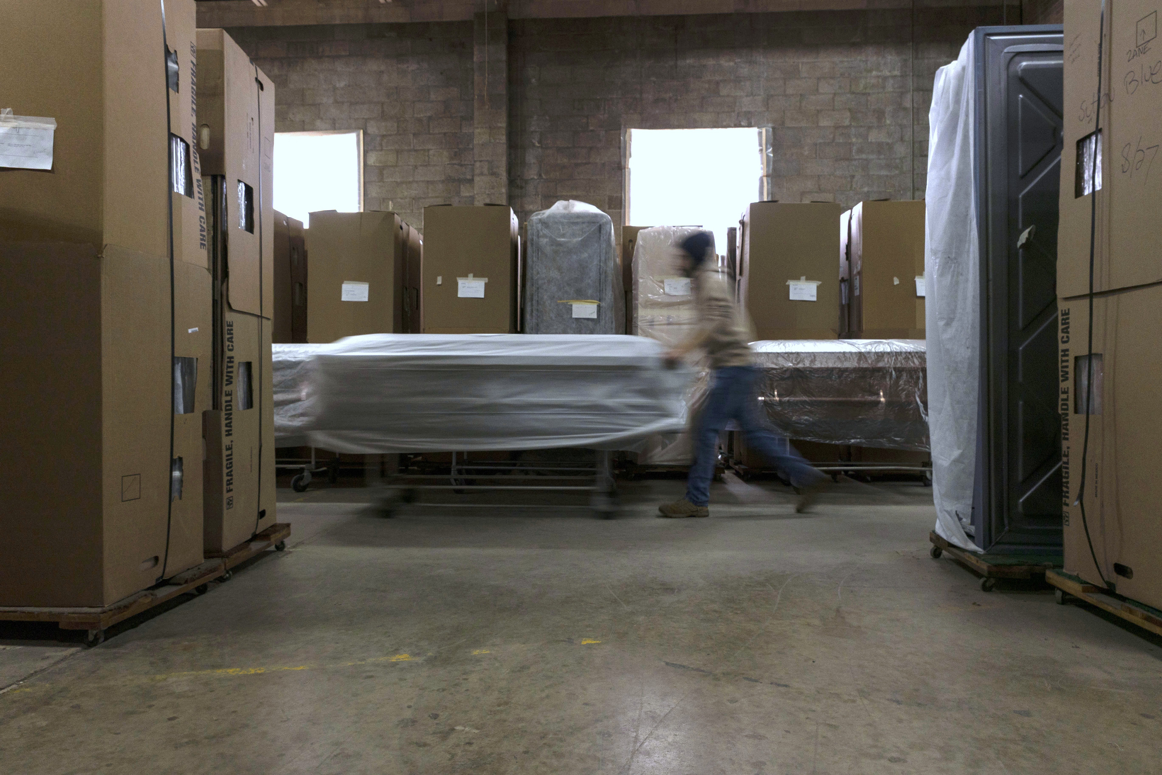 Tyler Hunley has been working odd jobs at Zane Casket Company since high school but officially became an employee two years earlier. "I was his (Dan's) neighbor so anytime he needed a hand, he'd call on me," said Tyler.