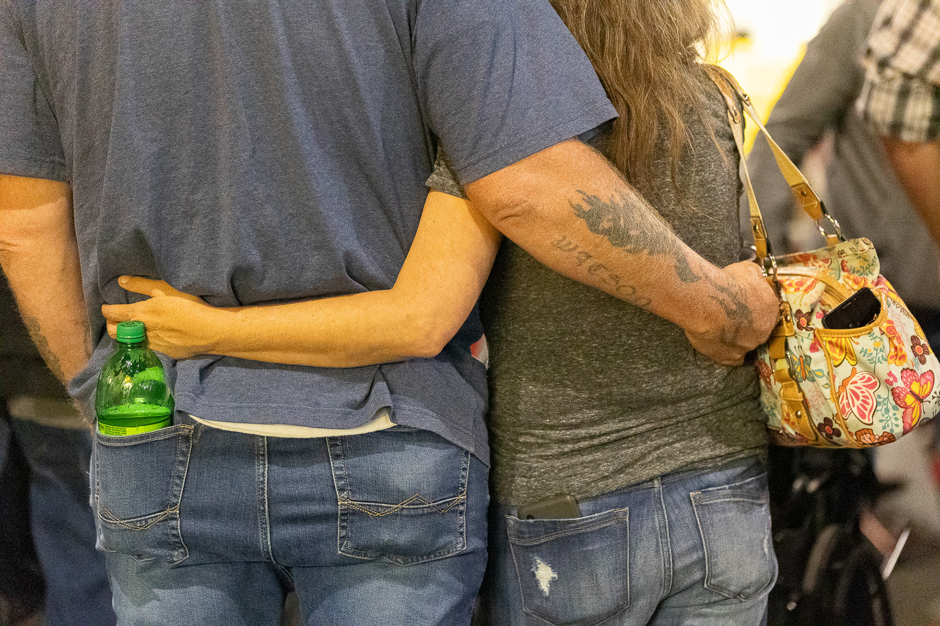A couple hold each other during a concert by the country band BlackHawk at the Jackson County Apple Festival in Jackson, Ohio, Sept. 22, 2023. The Apple Festival began in 1937 as a tribute to Jackson County's biggest commercial product, apples. Now, 82 years later, the Apple Festival brings in an estimated 80,000 people a year, according to the Jackson Apple Festival website.
