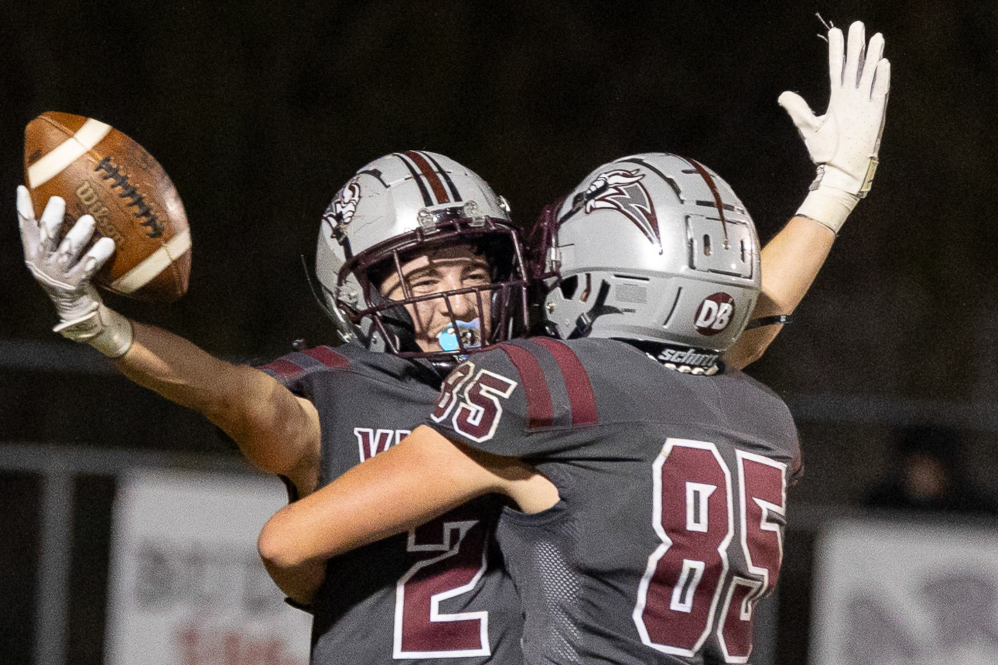 Vinton County High School Senior Owen Hire (85) hugs Dom Eli (2) after his touchdown catch during the football game against Wellston Oct. 20, 2023.