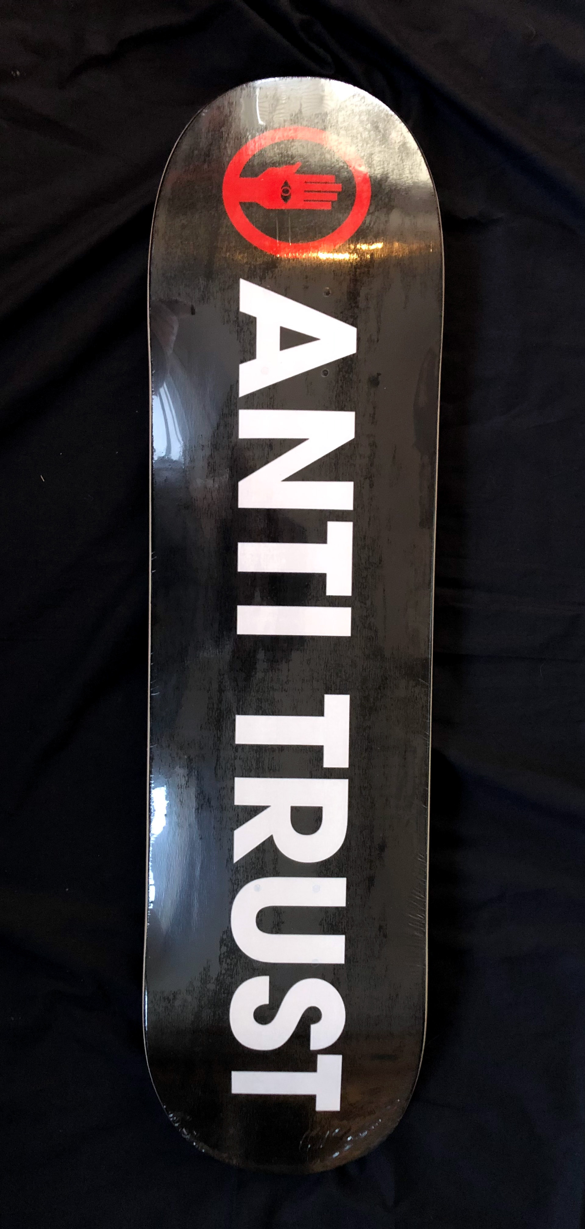 Anti Trust Red Hand White Text Board