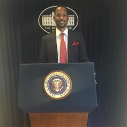 A photo of Ryan next to the Treasury Building.