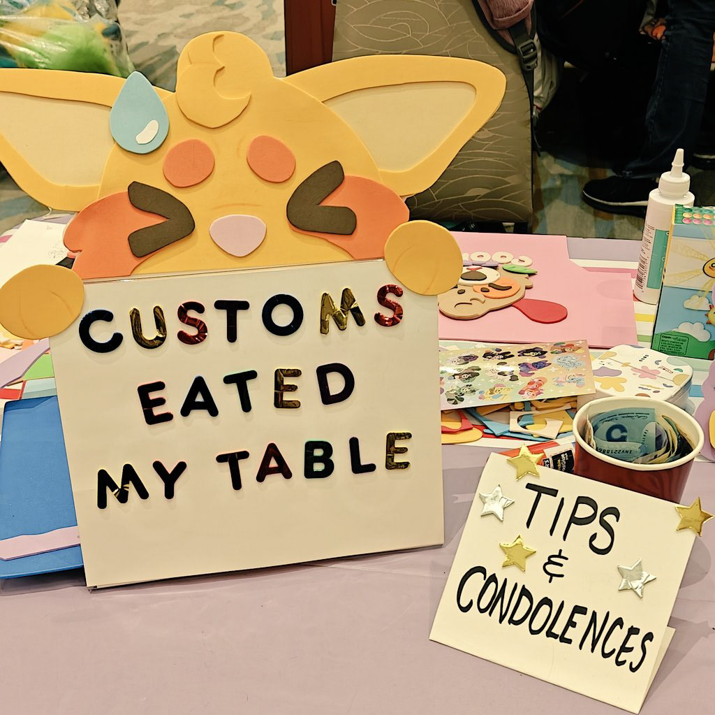 picture from Furnal Equinox 2026 - my products were held back by customs, so before the event I gathered craft supplys at a nearby craft store, and took craft comissions that weekend.