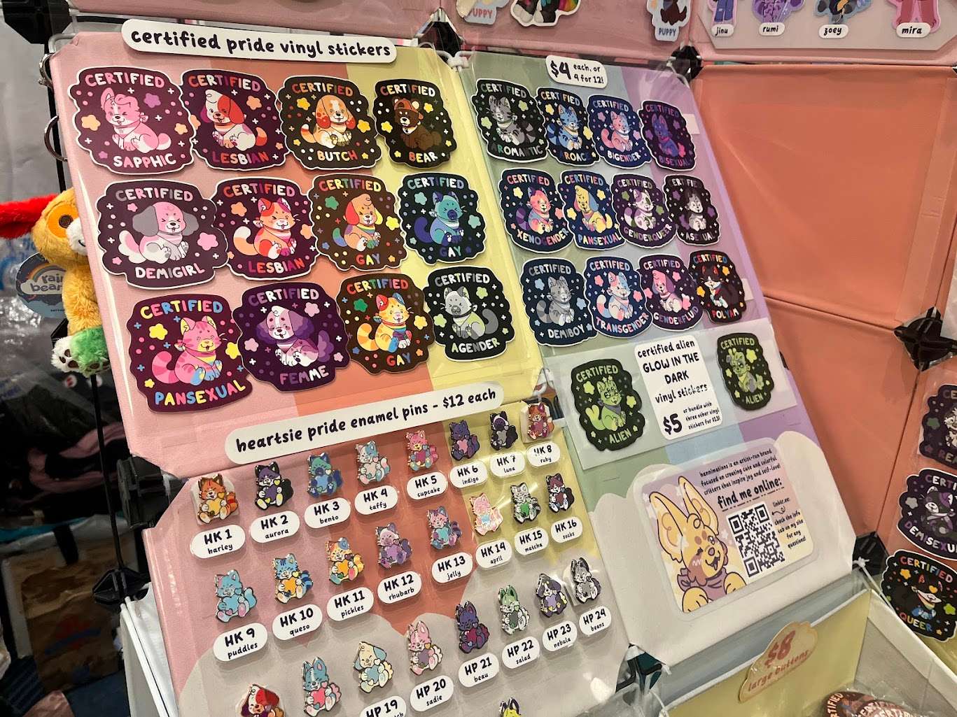 another closeup of some of my small item (stickers, enamel pins, etc) display from Furlandia 2026