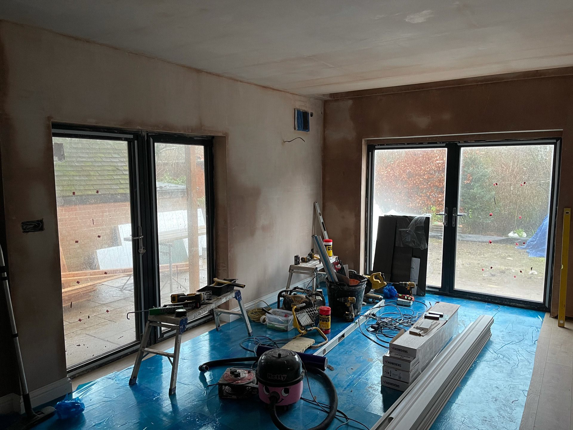 On goes the plaster