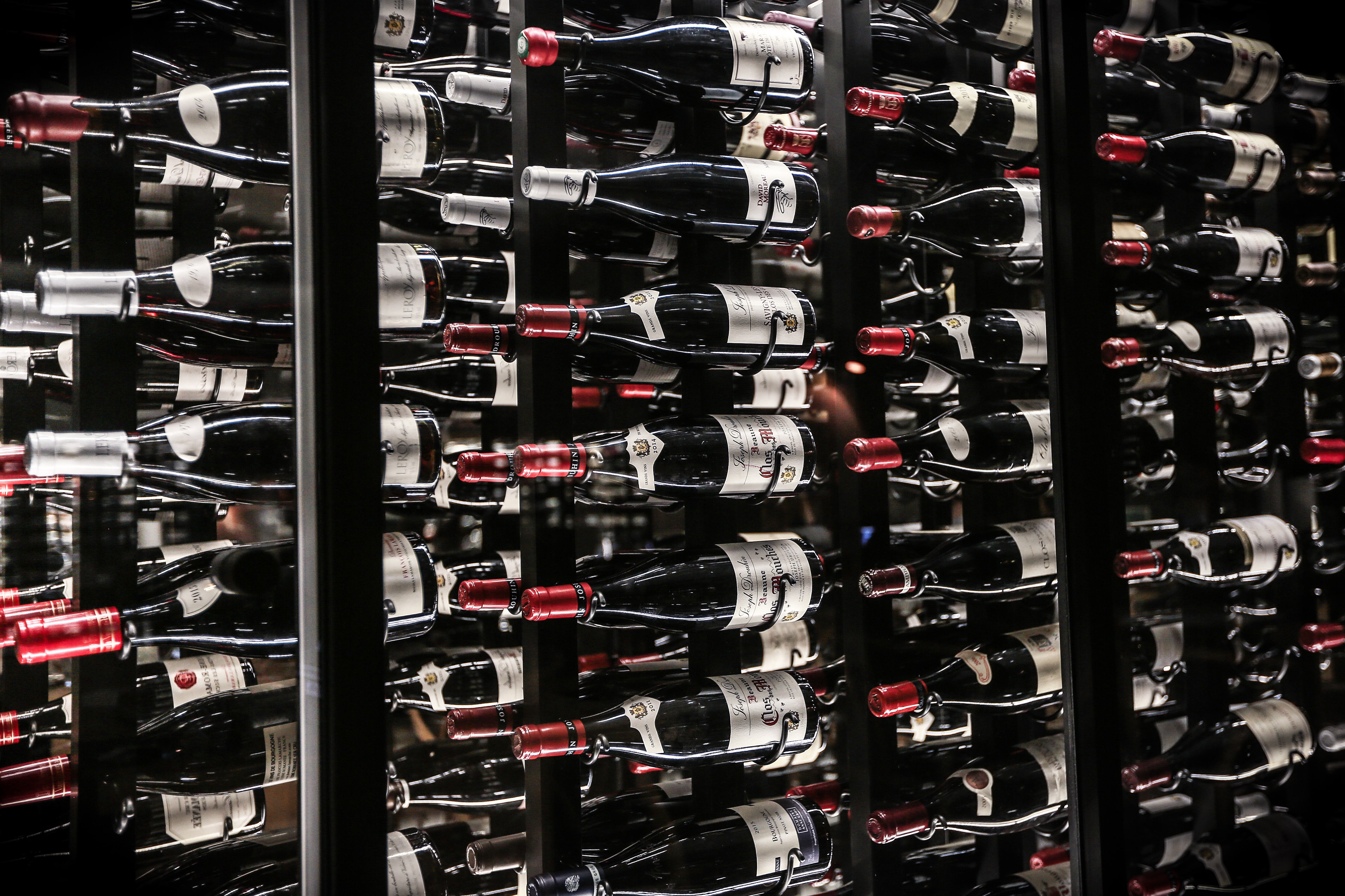 The wine rack with several very expensive and very old wines in the world's most secret restaurant / The Gastro Label / www.gastro-label.com