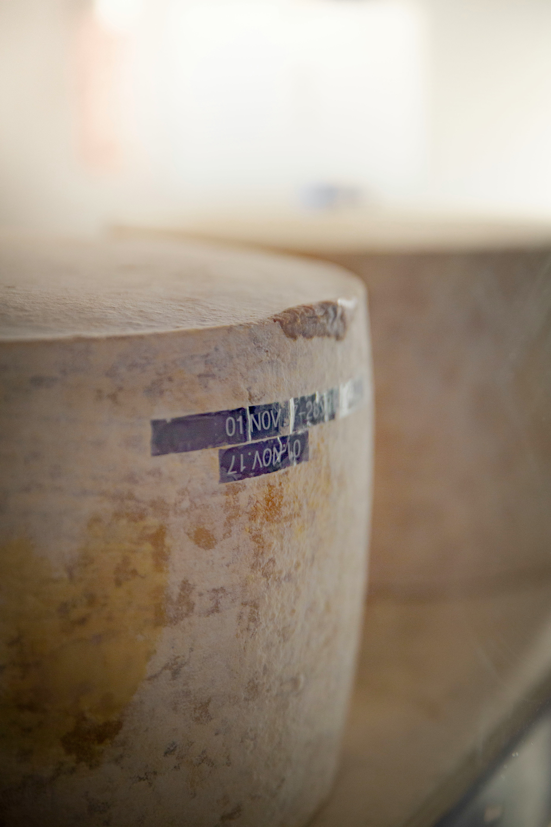 An old, maturing cheese with a date stamp / The Gastro Label / www.gastro-label.com