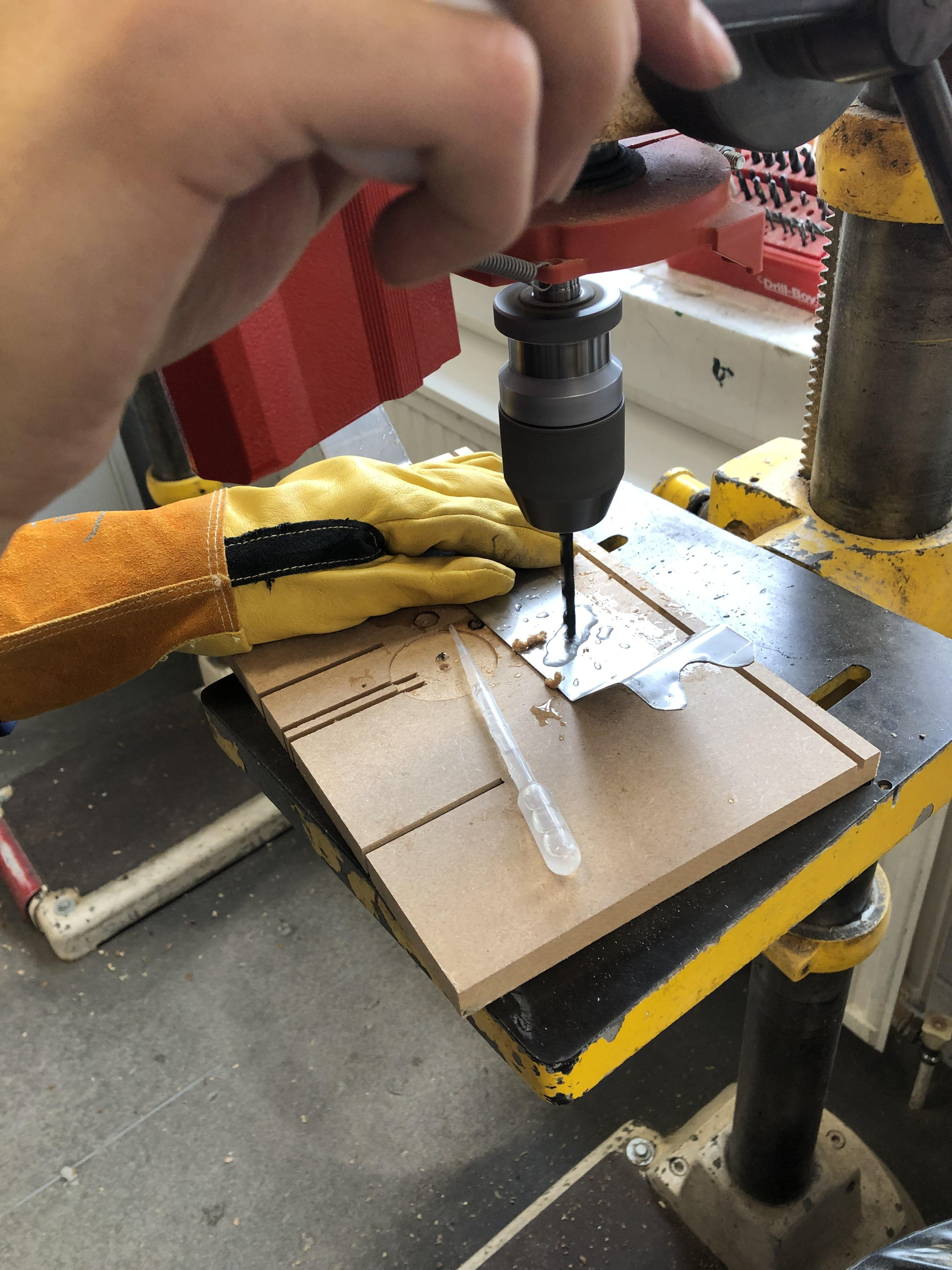 Drilling stainless steel for the cam plate