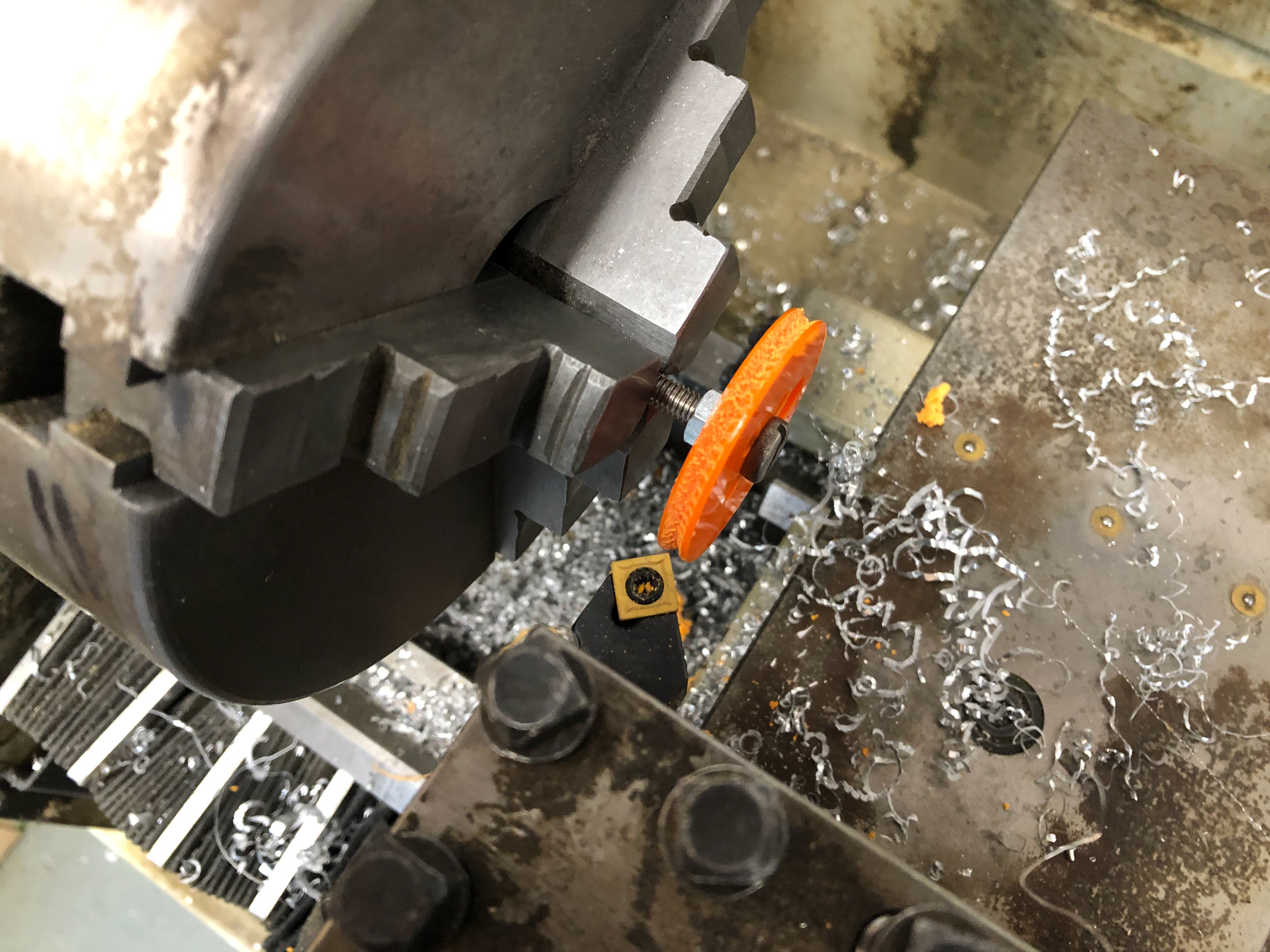 Turning a grooved acrylic pulley for cam system