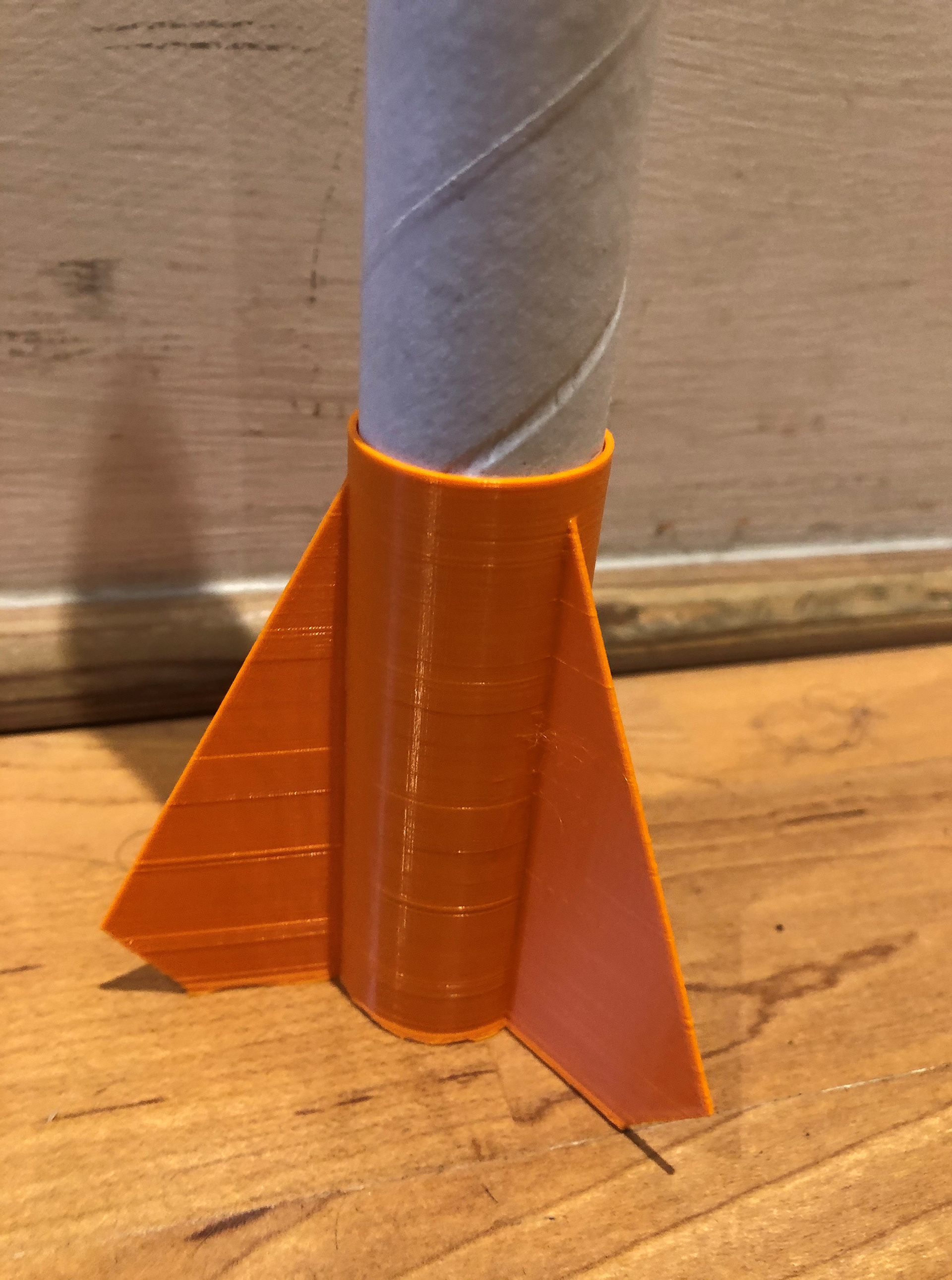 All-in-one fins and engine holder for model rocket