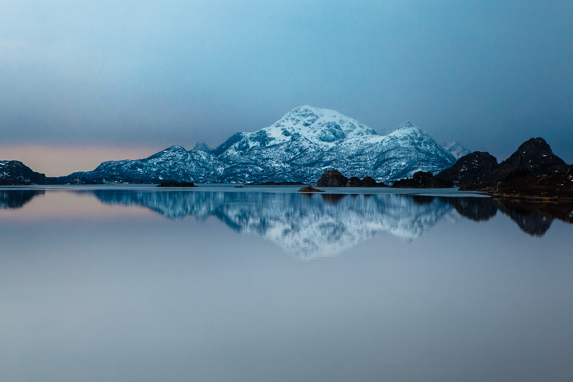 snow covered 751m peak Heggedalstinden on Store Molla (EN Stormolla) island, Lofoten