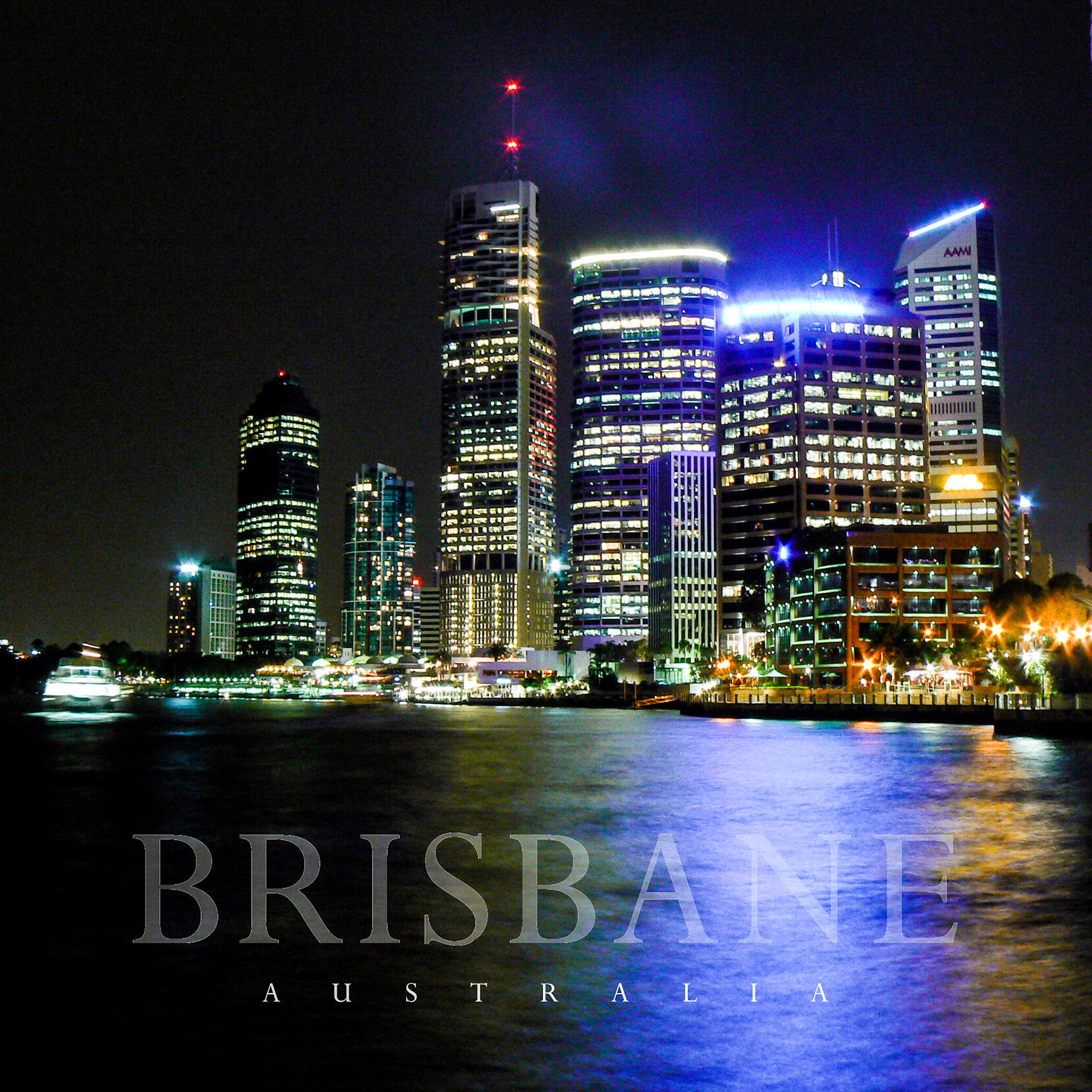 Brisbane CBD as seen from New Farm Riverwalk with the Brisbane River in the foreground