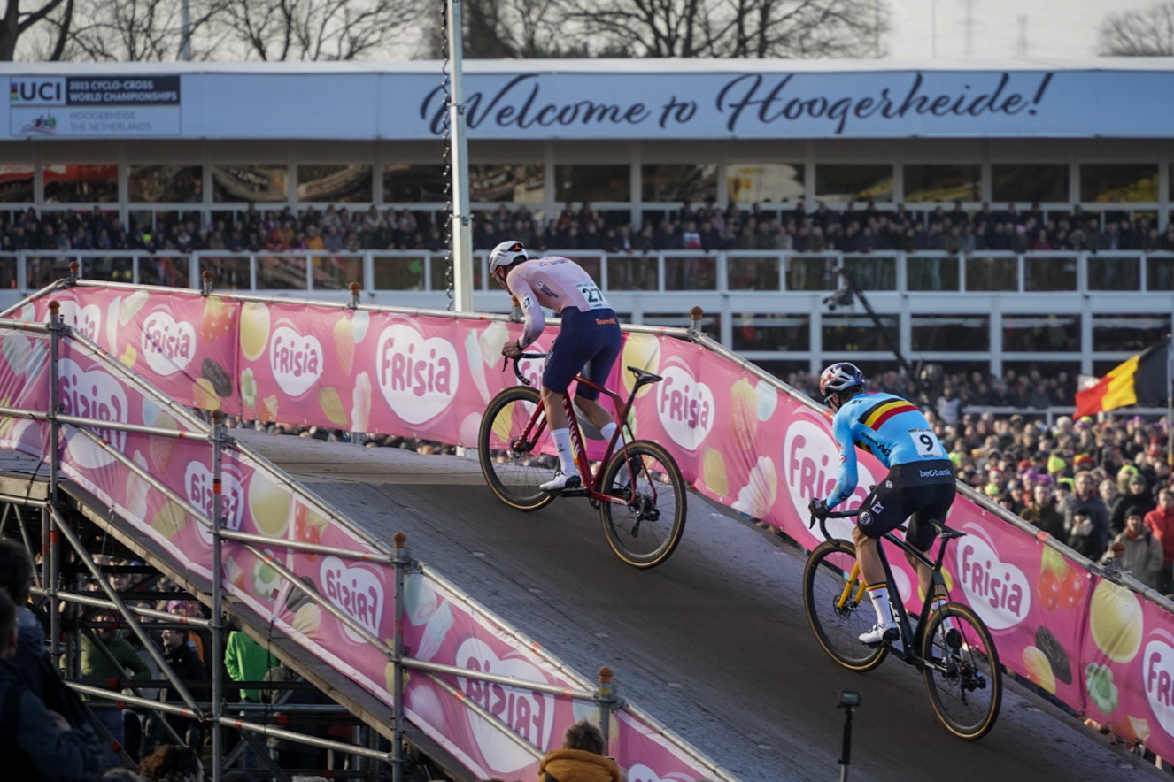Clash of the Titans; Belgian Wout van Aert and Dutchman Mathieu van der Poel battling for  the win at the 2023 World Championships Cyclo-cross at Hoogerheide, the Netherlands