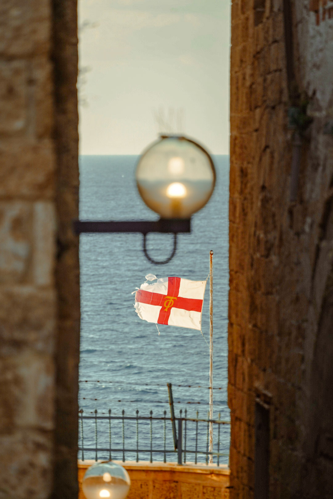 Protectors of the Tomb; Flag of the Brotherhood of the Holy Sepulchr with the letters "ΤΦ" (Tau + Phi) representing the words "phylakes taphou" ('Protectors of the Tomb')