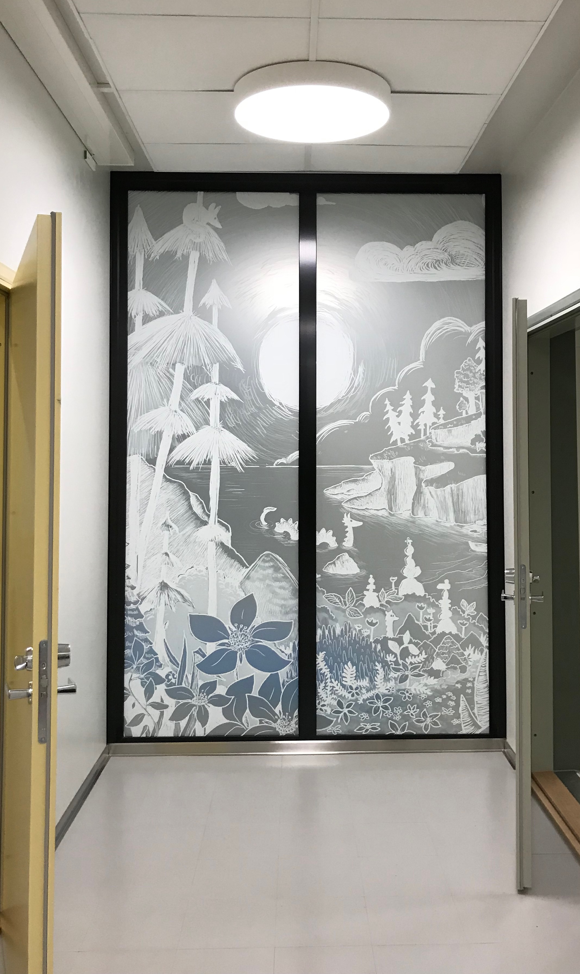 Some of the dividing glass windows and doors got a white taped image