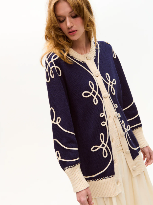 Knitted cardigan with soutache technique and handmade finishing