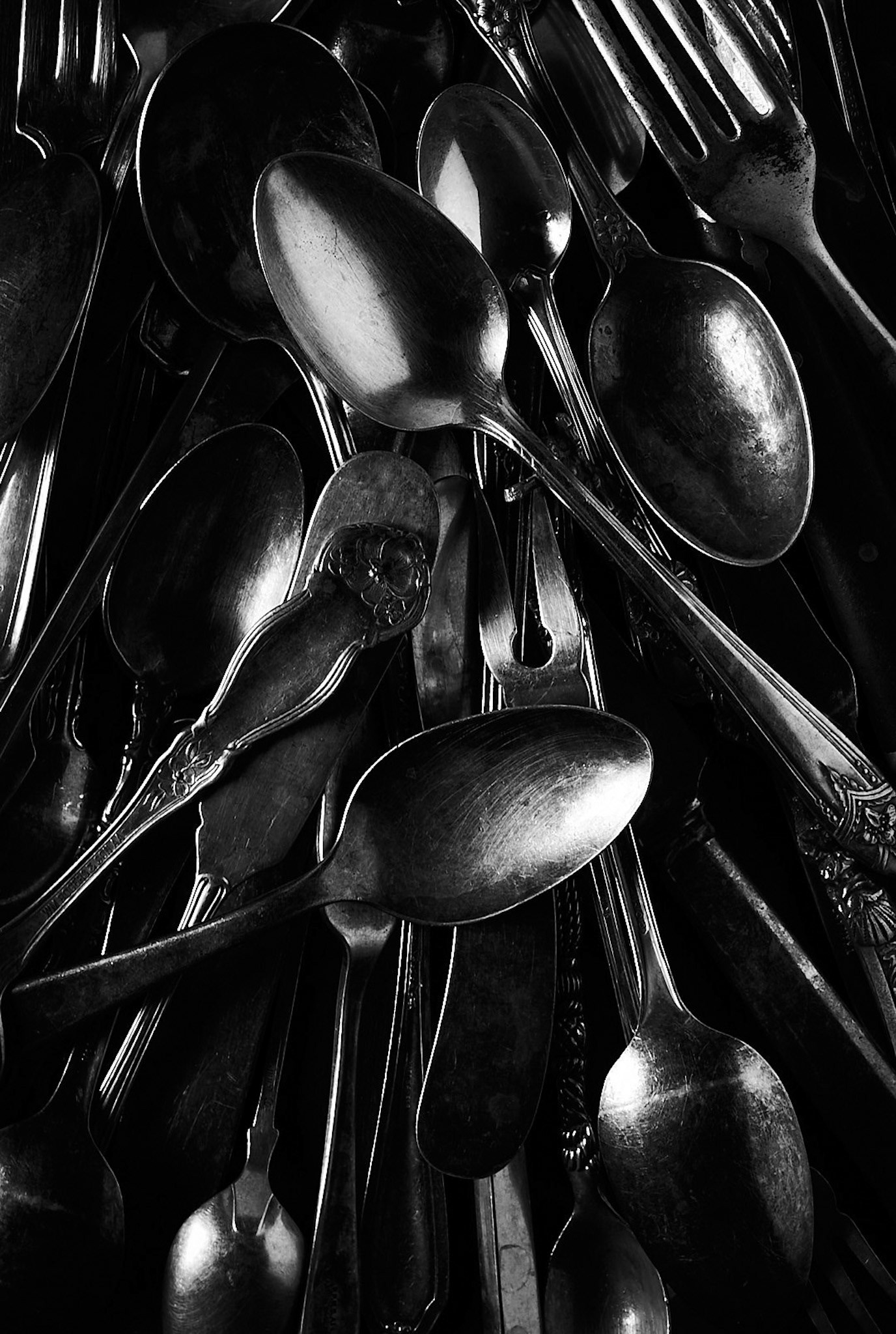 A food photography vintage silverware arrangement image in black and white, made by Kata Endrodi, a food photographer in Montreal