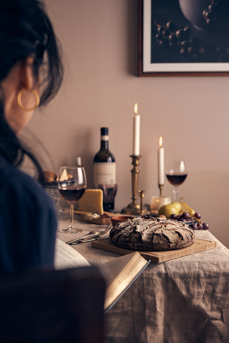 A food photography lifestyle portrait with candles and table setting, made by Kata Endrodi, a food and product photographer in Montreal