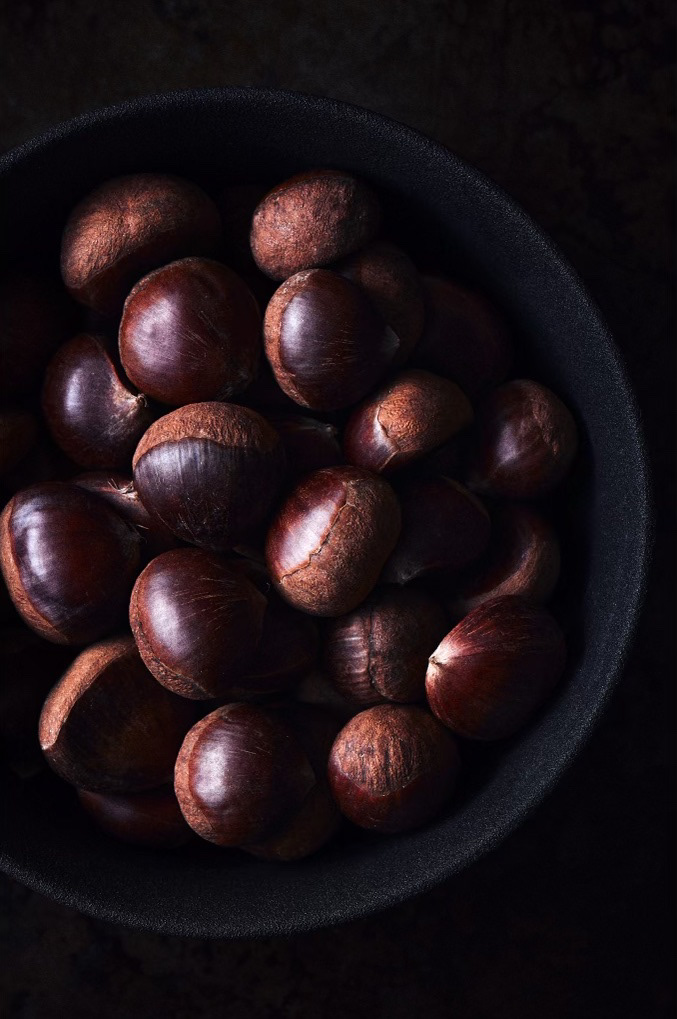 A food photography a bowl of chestnuts in black bowl, made by Kata Endrodi, a food and product photographer in Montreal