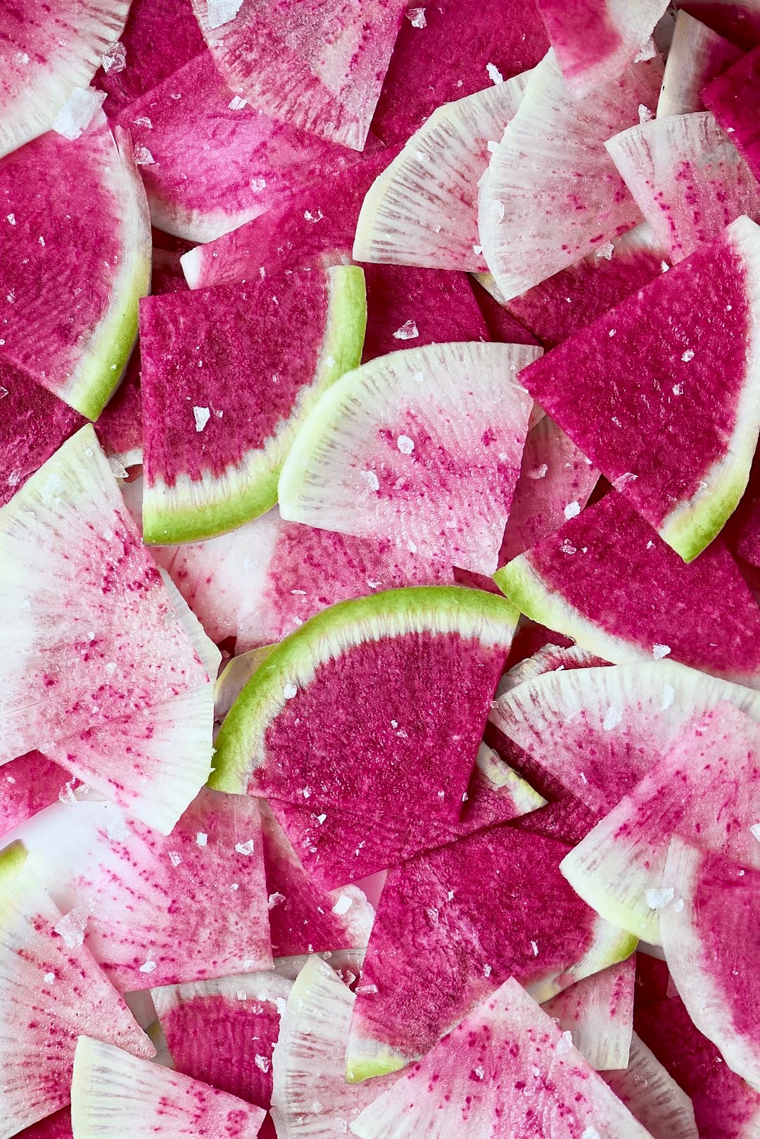A food photography watermelon radish slices closeup , made by Kata Endrodi, a food and product photographer in Montreal