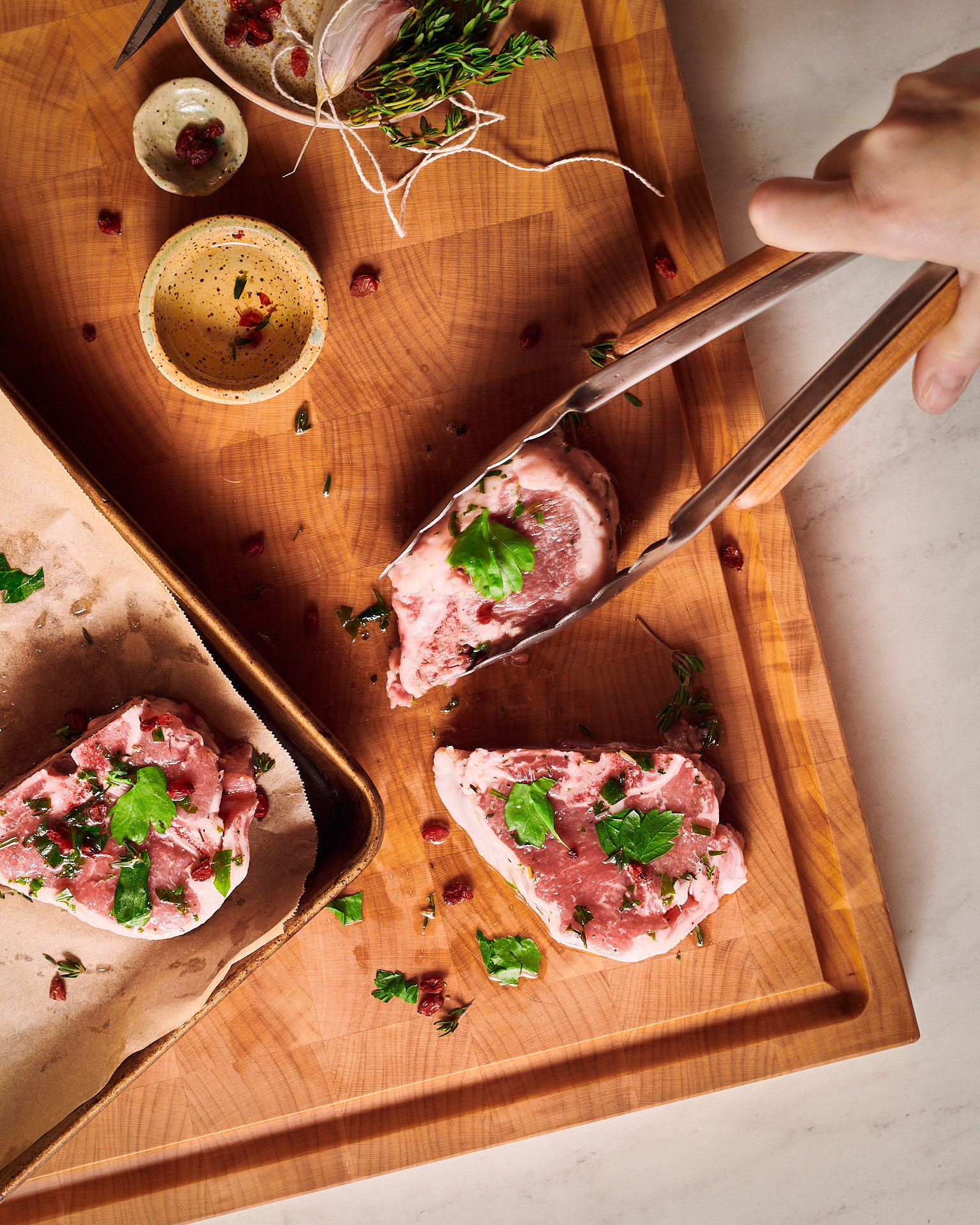 Professional lifestyle photography of raw meat preparation by Montreal photographer Kata Endrodi.