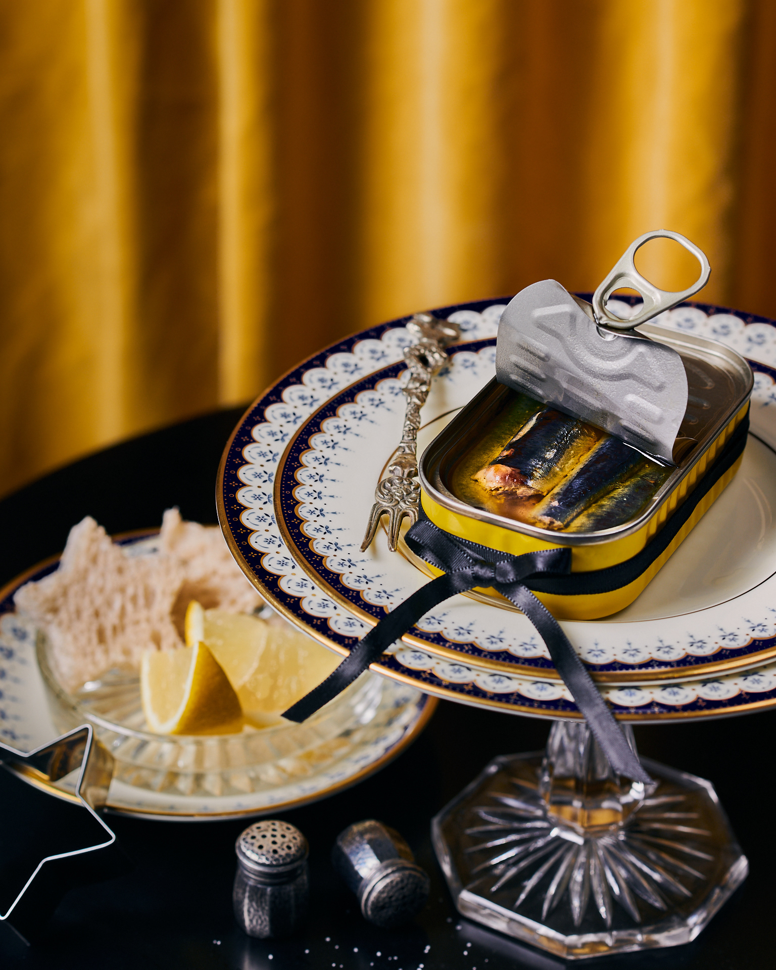 Kata Endrodi Montreal food and product photographer, a vibrant yellow-themed lifestyle scene featuring sardines and festive food styling