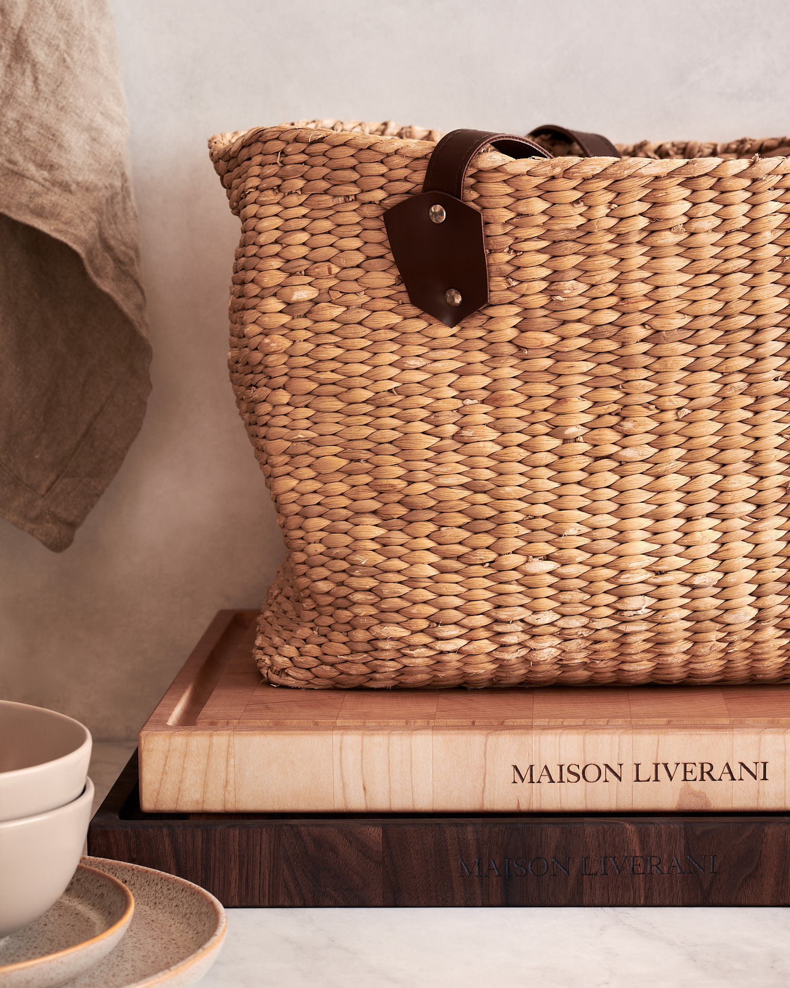 Artisanal kitchen lifestyle photography featuring wooden boards and woven baskets, captured by Montreal food photographer Kata Endrodi.