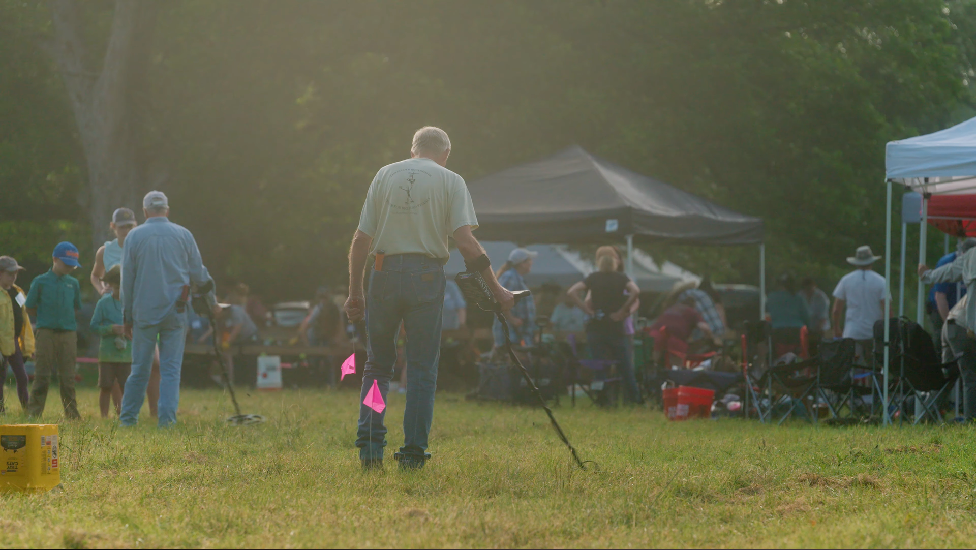 Volunteers metal detecting  at the Texas Archeological Society Field School.