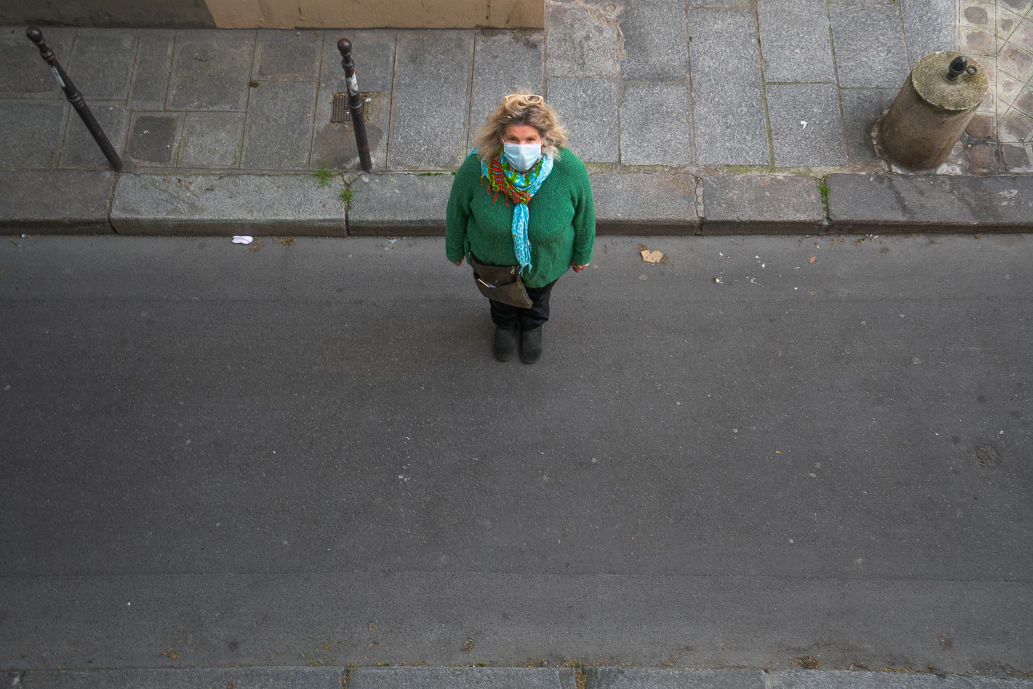 family friend quickly standing in front of my camera before having her groceries delivered