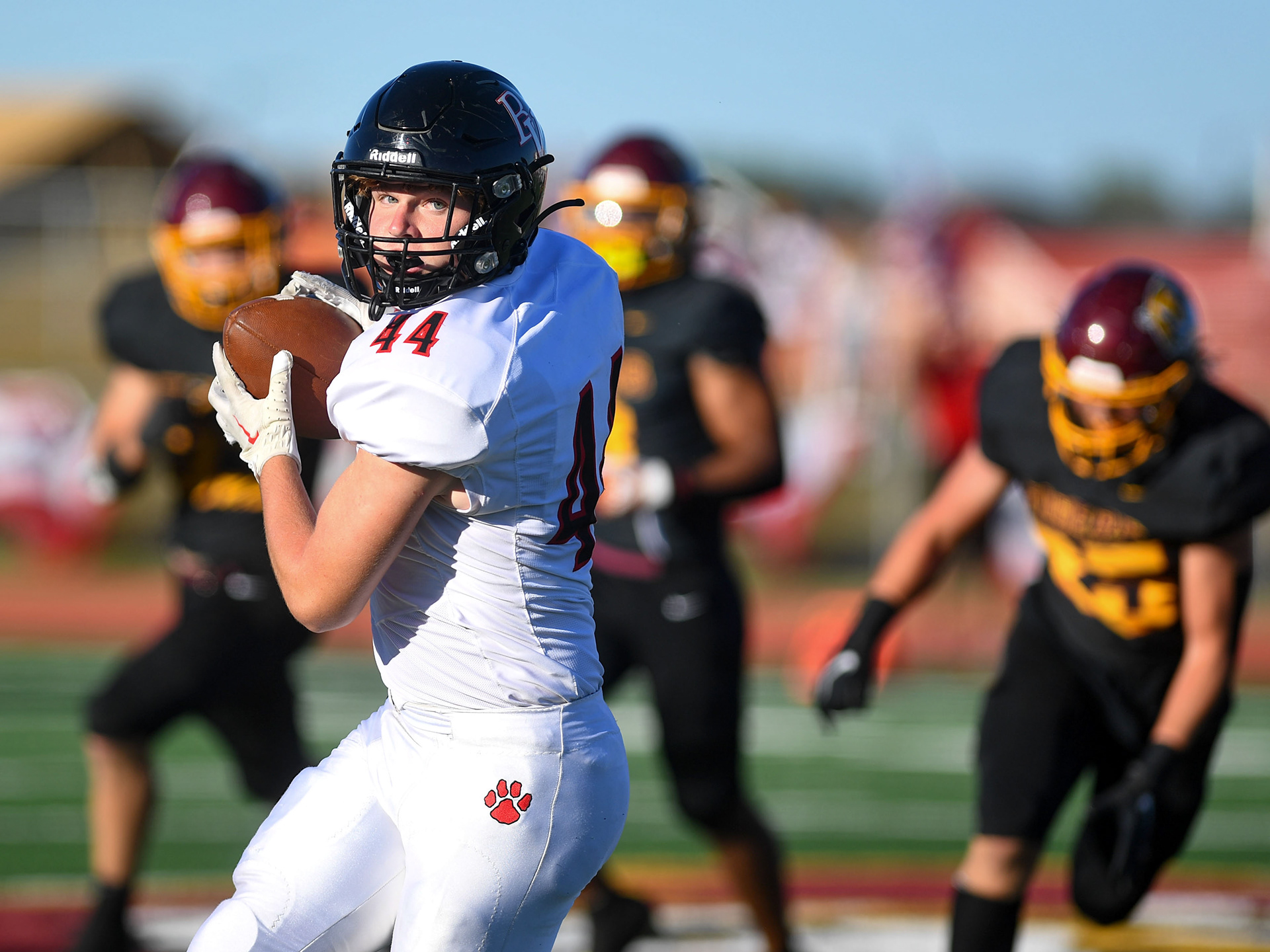 Brandon Valley's Micah Nelson turns to carry the ball after catching a pass on Friday, September 2, 2022, at Harrisburg High School.